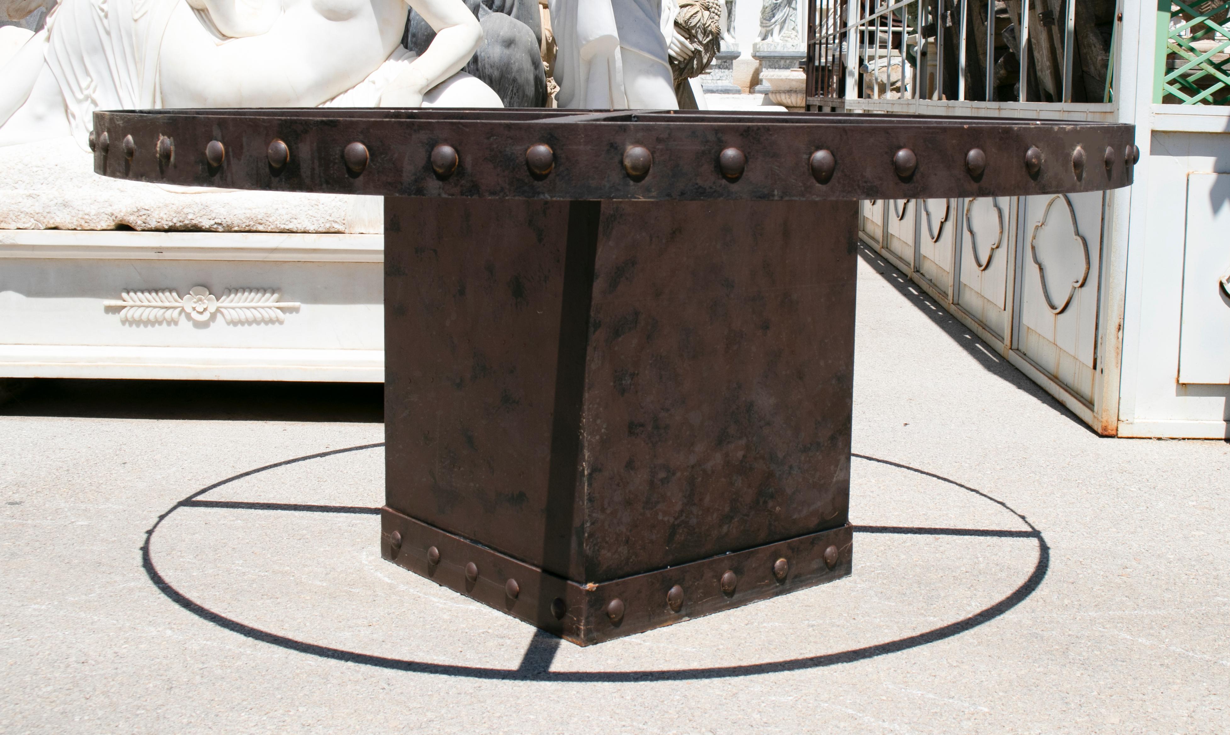 Square iron table base with ornamental border, ideal for a round tabletop.