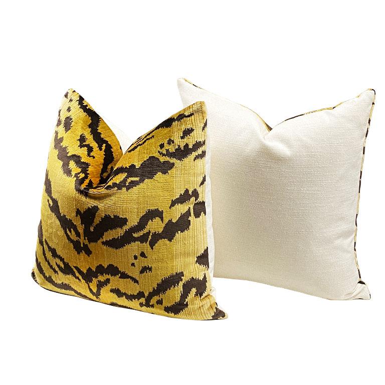 Square shape animal motif tiger print pillow. The front features gorgeous thick velvet animal print. Back features a crisp cream. Down-filled. Knife edge with zipper. Fabric is a designer fabric and originates in Belgium.

Dimensions:
19