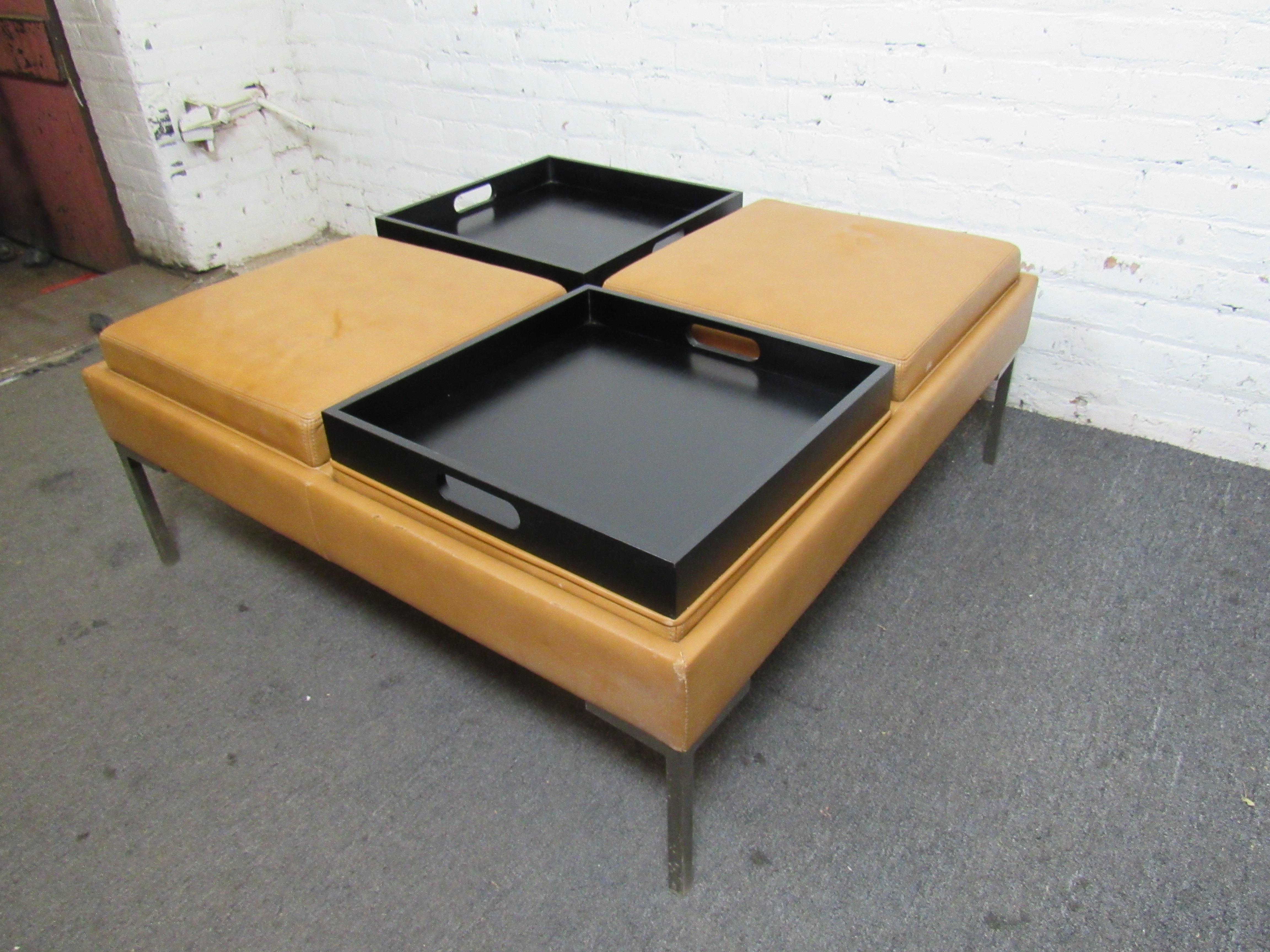 Unique leather bench with reversable tray cushions. Could function as an informal table to sit around. 
Location: Brooklyn NY.