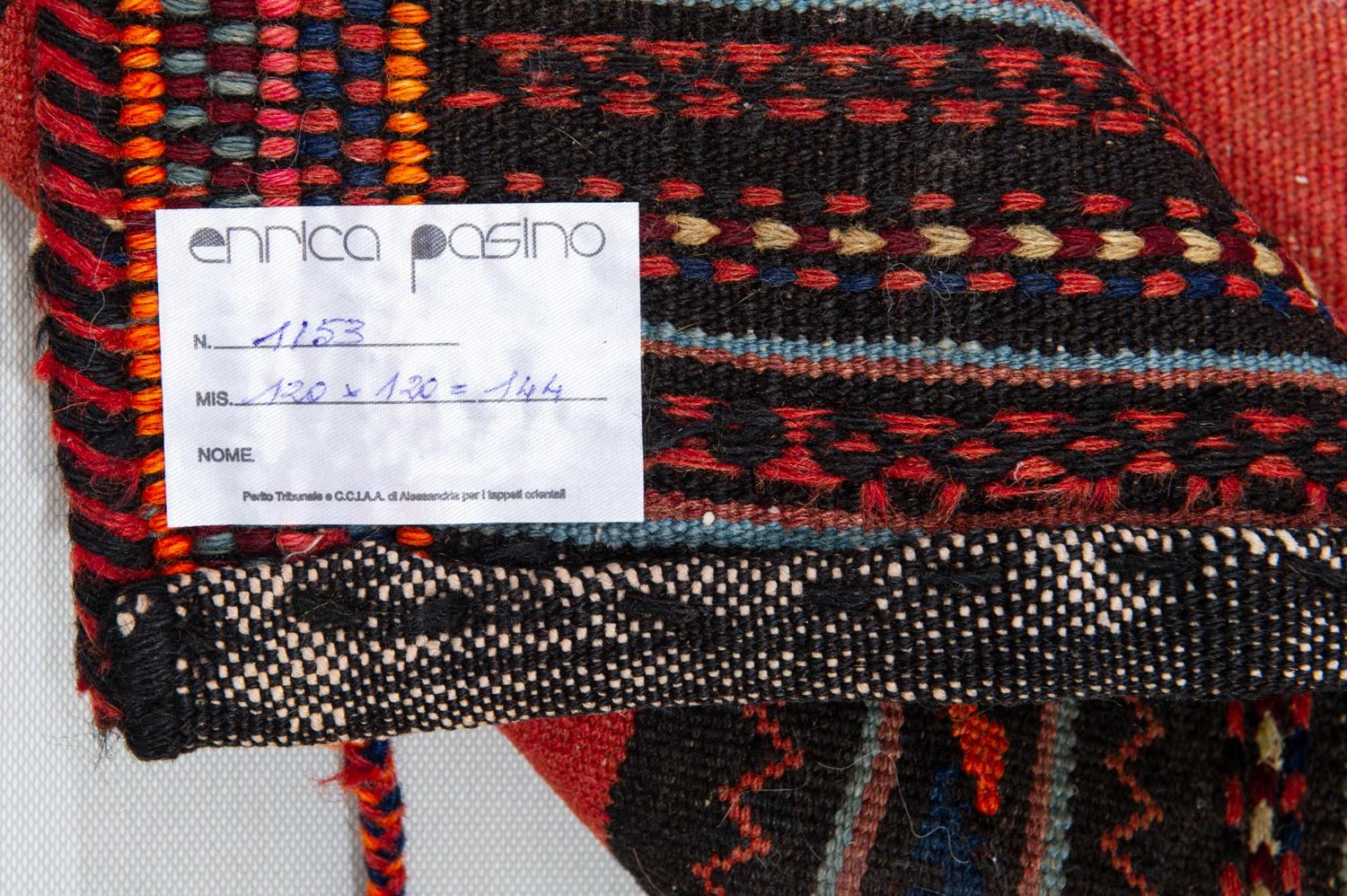 nr. 1153 - Interesting and rare little square kilim, used among nomads as table cloth laid on the ground.
The wools have been dyed with vegetable colors: central light blue streaks with indigo.
From my private collection.