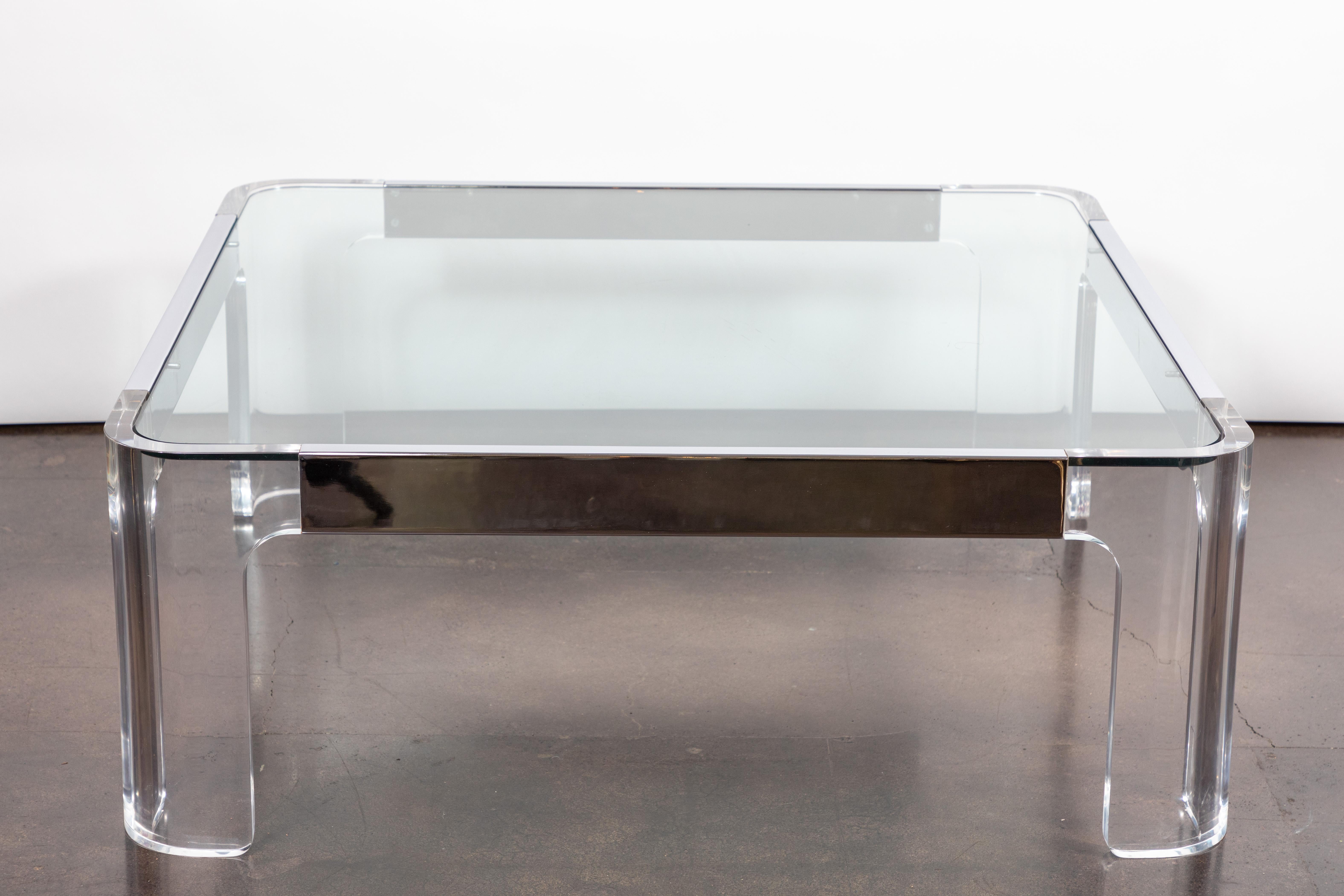 Chic polished chrome and Lucite coffee table by iconic designer Charles Hollis Jones. Acrylic has been professionally polished and chrome is in excellent condition.