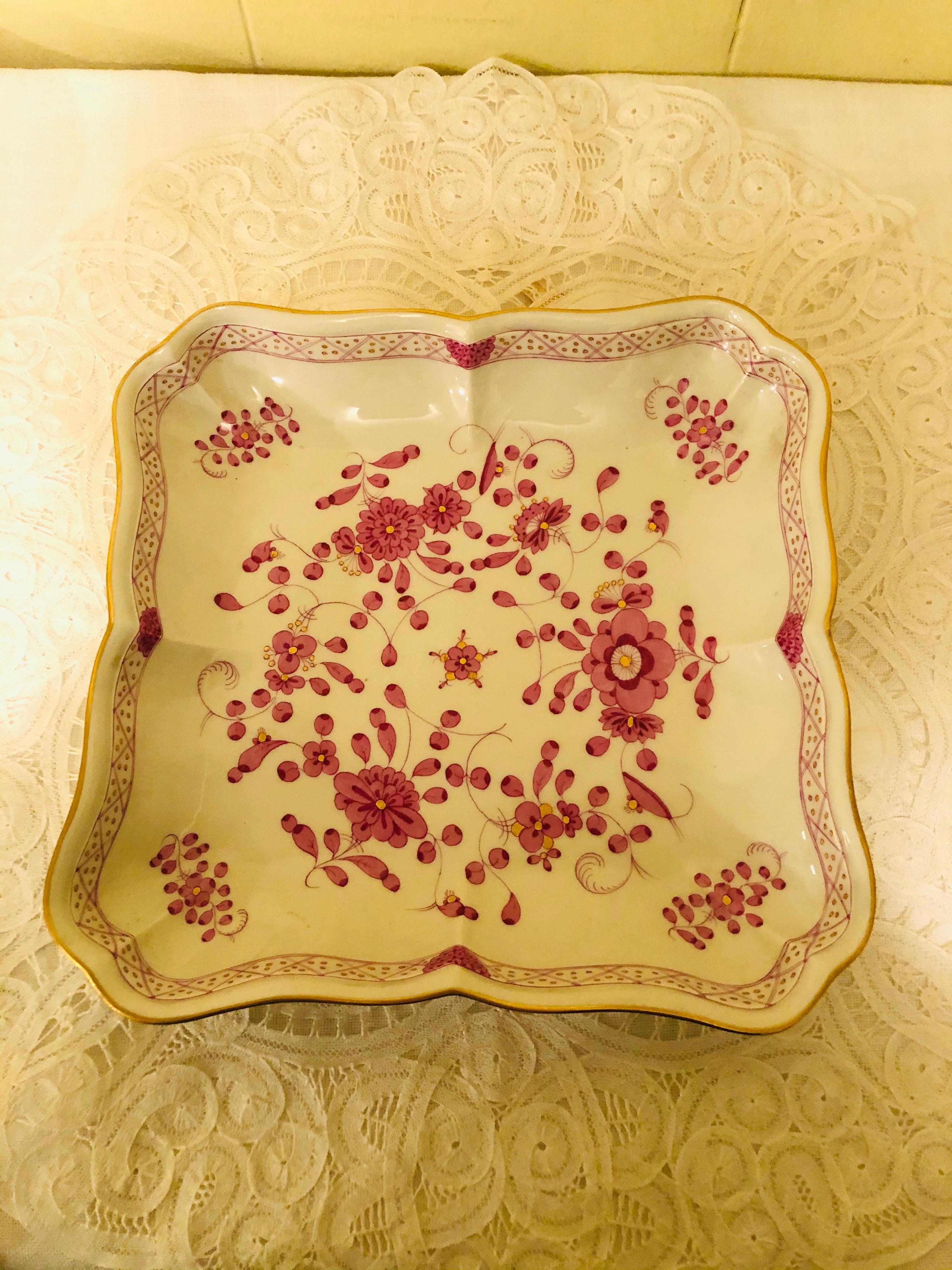 I would like to offer you this beautiful Meissen purple Indian serving bowl in this unusual square form.  It has detailed paintings of pink flowers with some purple and gold accents on a white ground. The detail of the painting on this bowl is