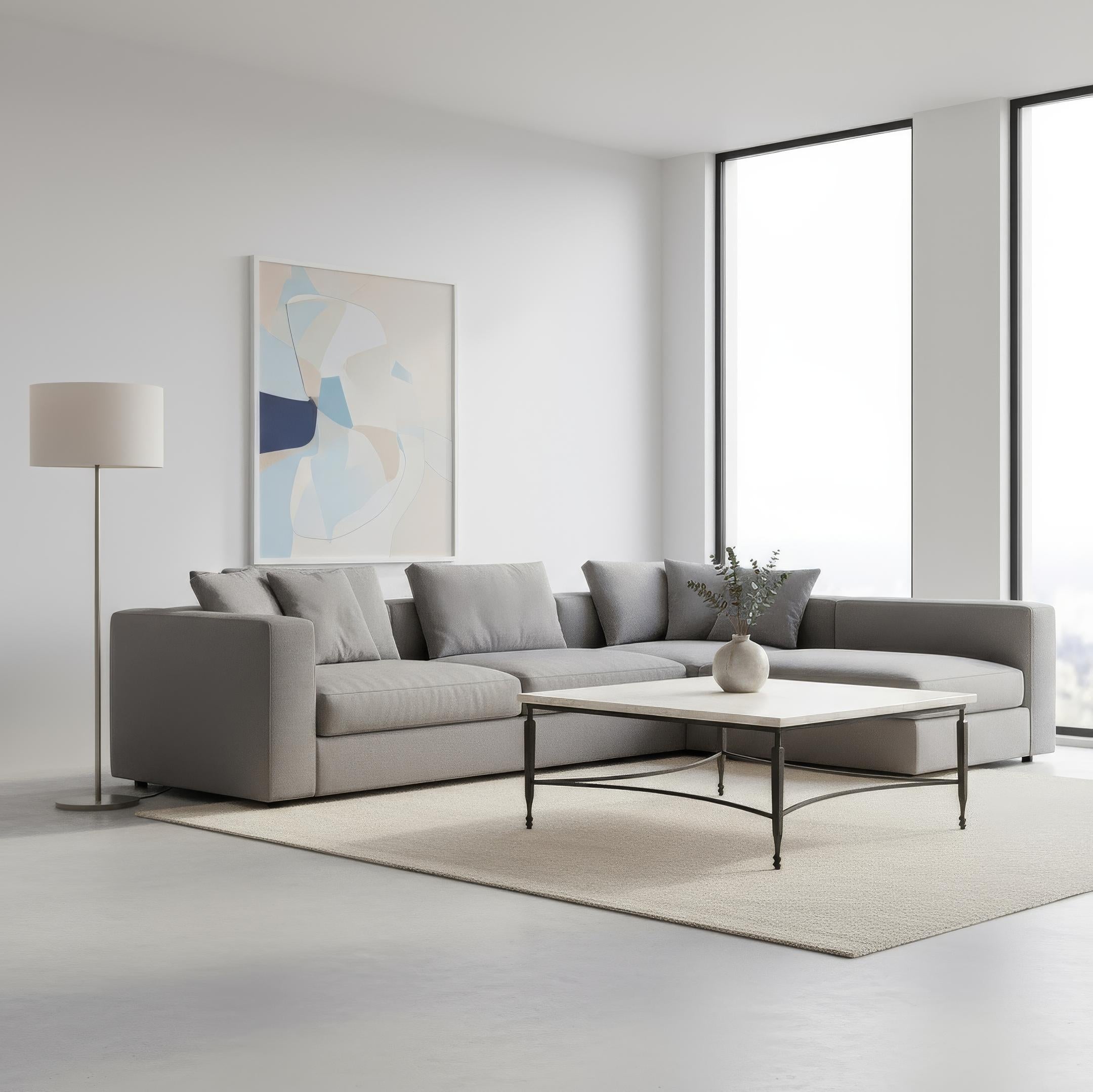 Coffee table blends timeless natural stone with artisanal ironwork, offering a refined centerpiece for both modern and classic interiors. Its polished White Banswara marble top highlights the beauty of natural veining. The base is crafted from