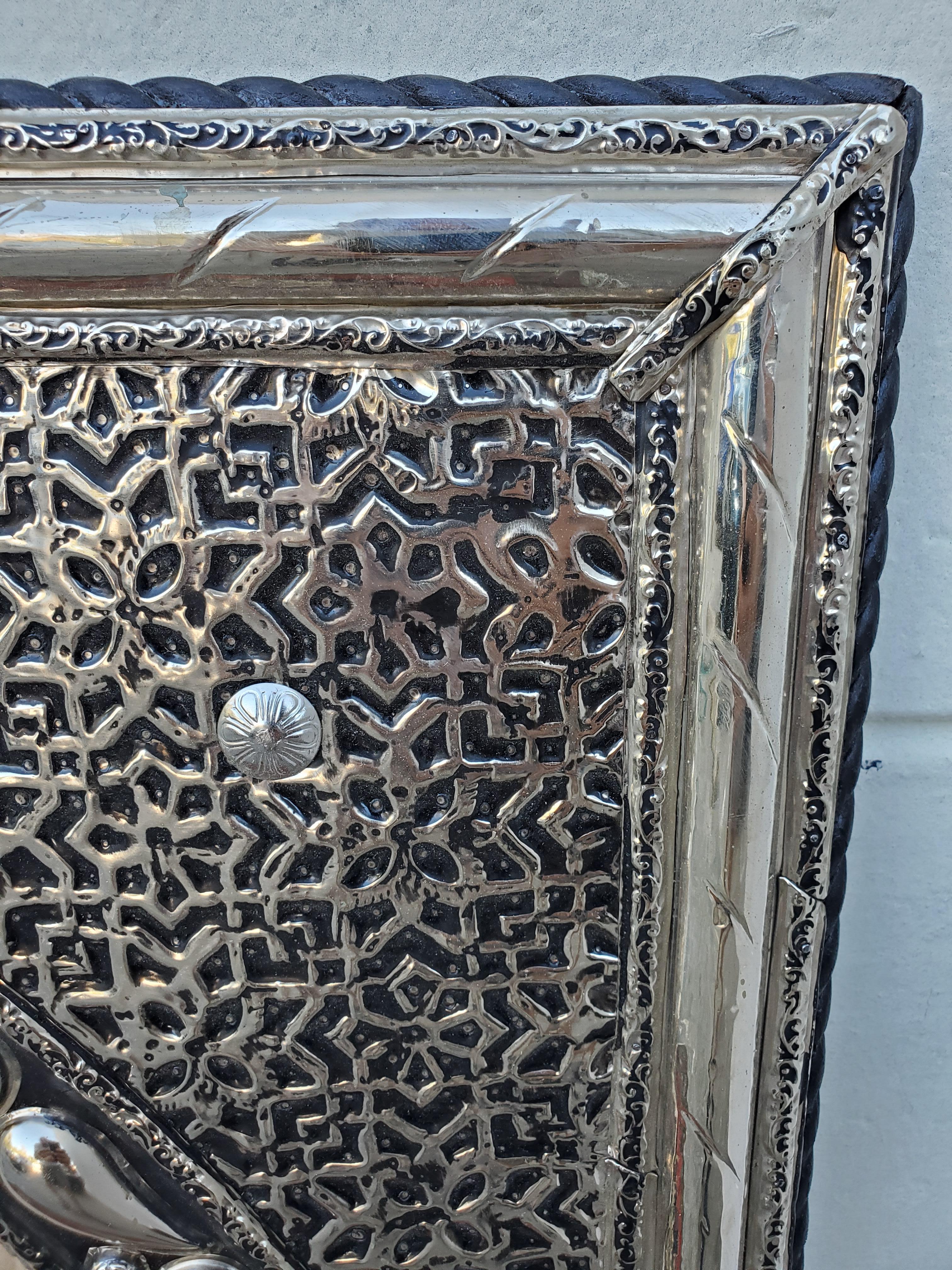 Large metal inlaid Moroccan mirror. Made in the city of Marrakech. Square shape measuring approximately 36