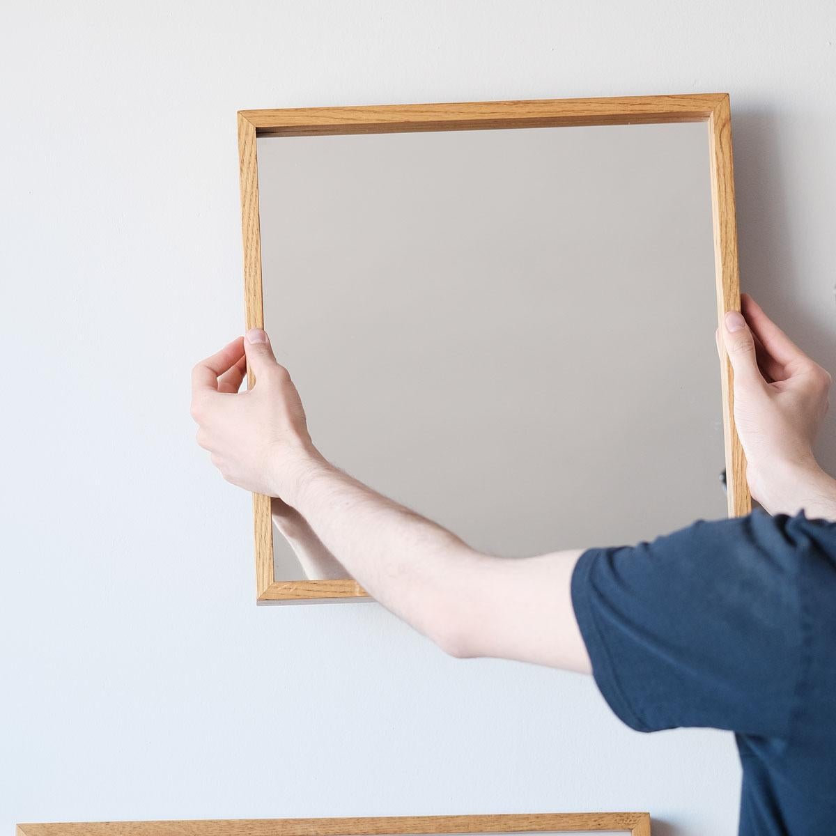The EDGE Series Square Oak-Framed Mirror stands out with its natural durability and timeless craftsmanship, meticulously handcrafted from solid oak wood. Each mirror is unique, thanks to the distinct grain patterns and textures of the oak, giving