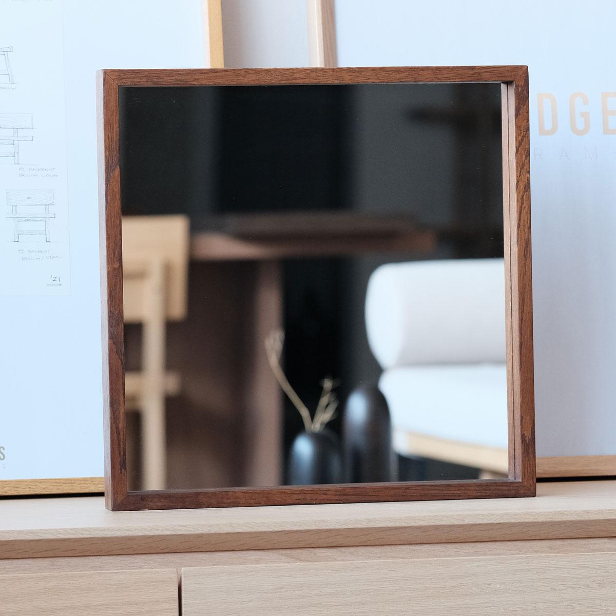 The EDGE Series Square Oak-Framed Mirror stands out with its natural durability and timeless craftsmanship, meticulously handcrafted from solid oak wood. Each mirror is unique, thanks to the distinct grain patterns and textures of the oak, giving
