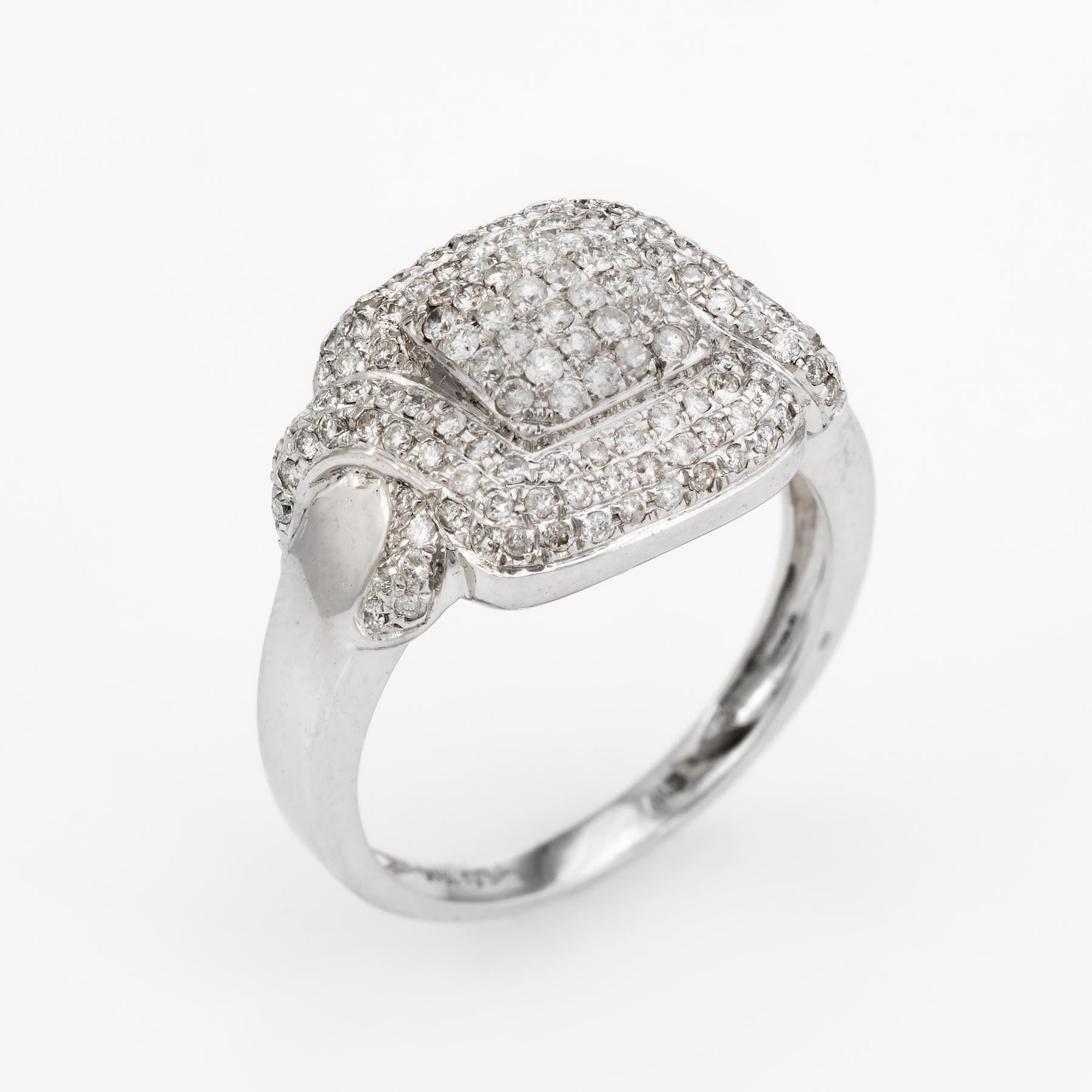Elegant estate cocktail ring, crafted in 18 karat white gold. 

Round brilliant cut diamonds are pave set into the mount and total an estimated 1.46 carats (estimated at I-J color and SI1-I1 clarity).   

The ring is in excellent condition.