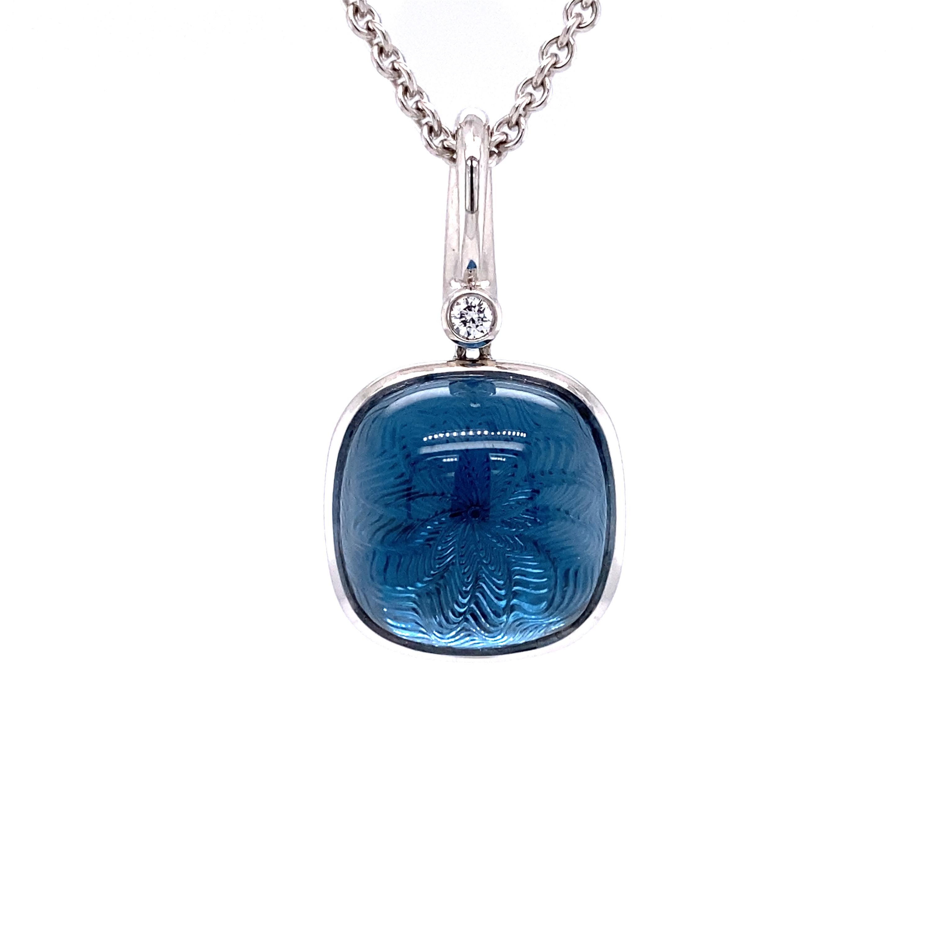 Victor Mayer square shaped pendant necklace 18k white gold, Era collection, 1 diamond, total 0.04 ct, G VS, brilliant cut, 1 blue topaz cabochon, guilloche wave pattern, diameter app. 16.0 mm

About the creator Victor Mayer
Victor Mayer is