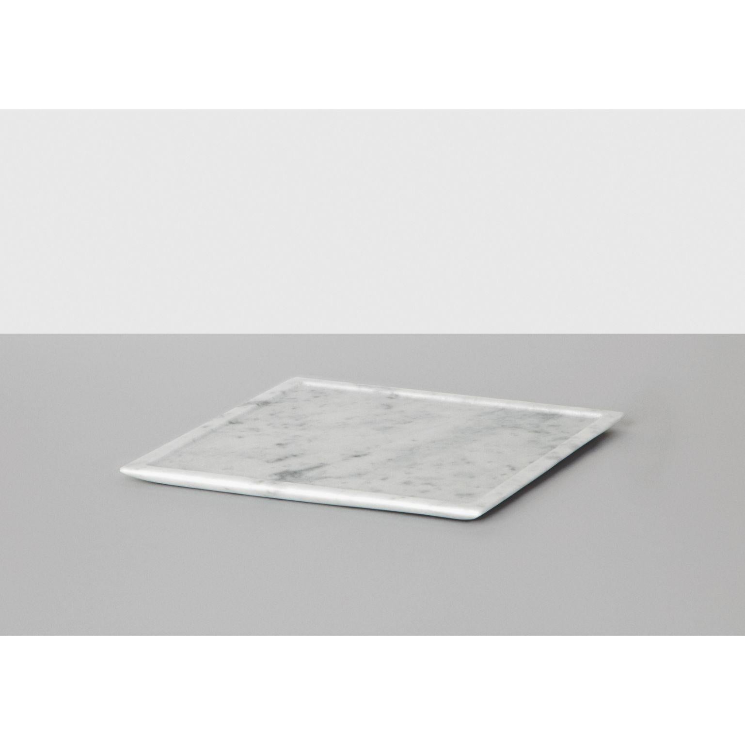 Square piano plate by Studioformart
Total marble collection
Dimensions: 22 x 22 x 18 cm
Materials: Bianco Carrara

The history of marble carving is lost in time; in one breath, it takes us back to the IV century BC, to ancient Greece where