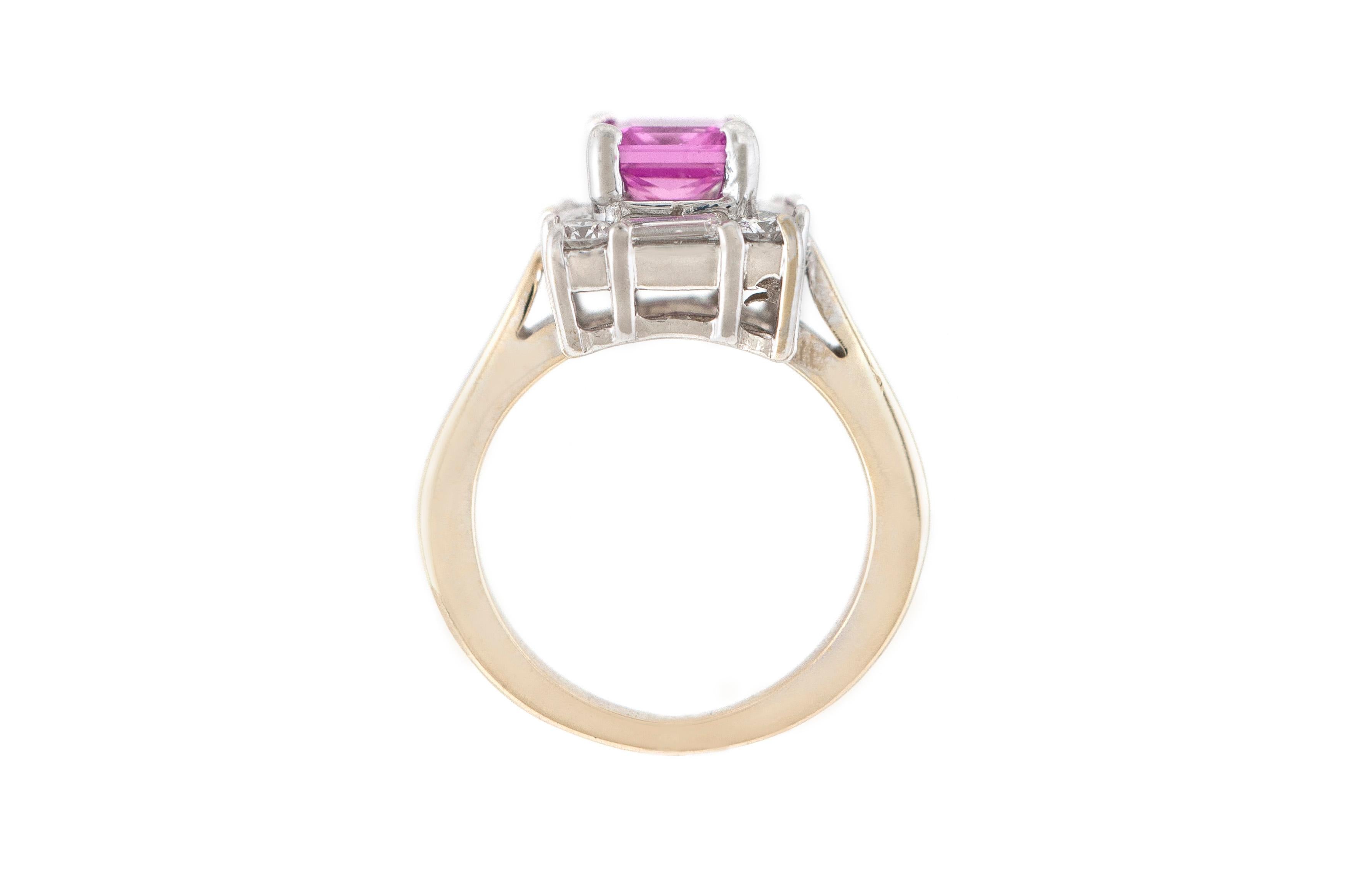 The ring is finely crafted in 18k white gold with center stone pink sapphire weighing approximately total of 1.50 carat and diamonds weighing approximately total of 0.80 carat.