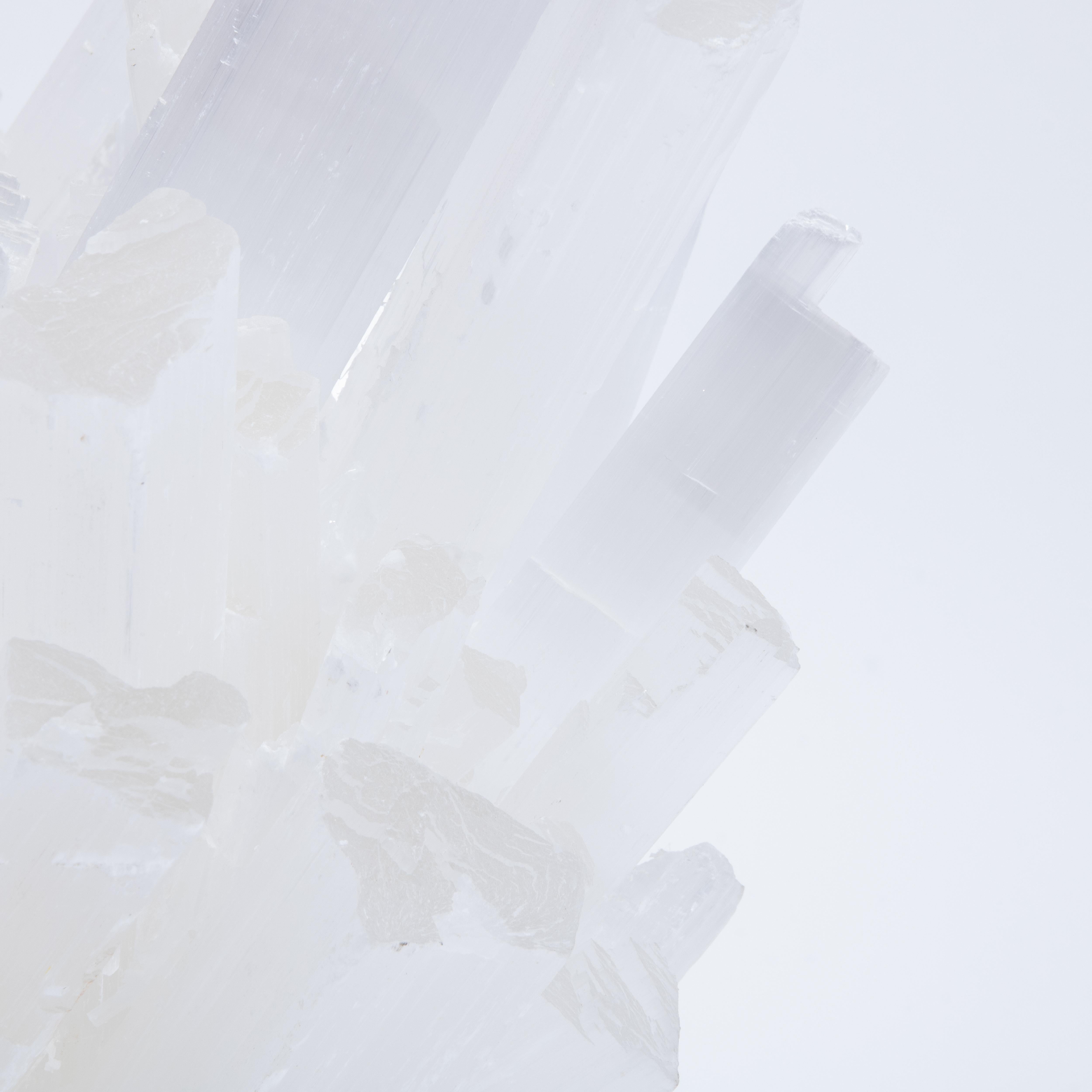 Indulge in the captivating allure of Kathryn McCoy's Rock Crystal Collection, a masterpiece that seamlessly blends nature's raw beauty with exquisite craftsmanship. Available in various sizes and customizable with a selection of different rock