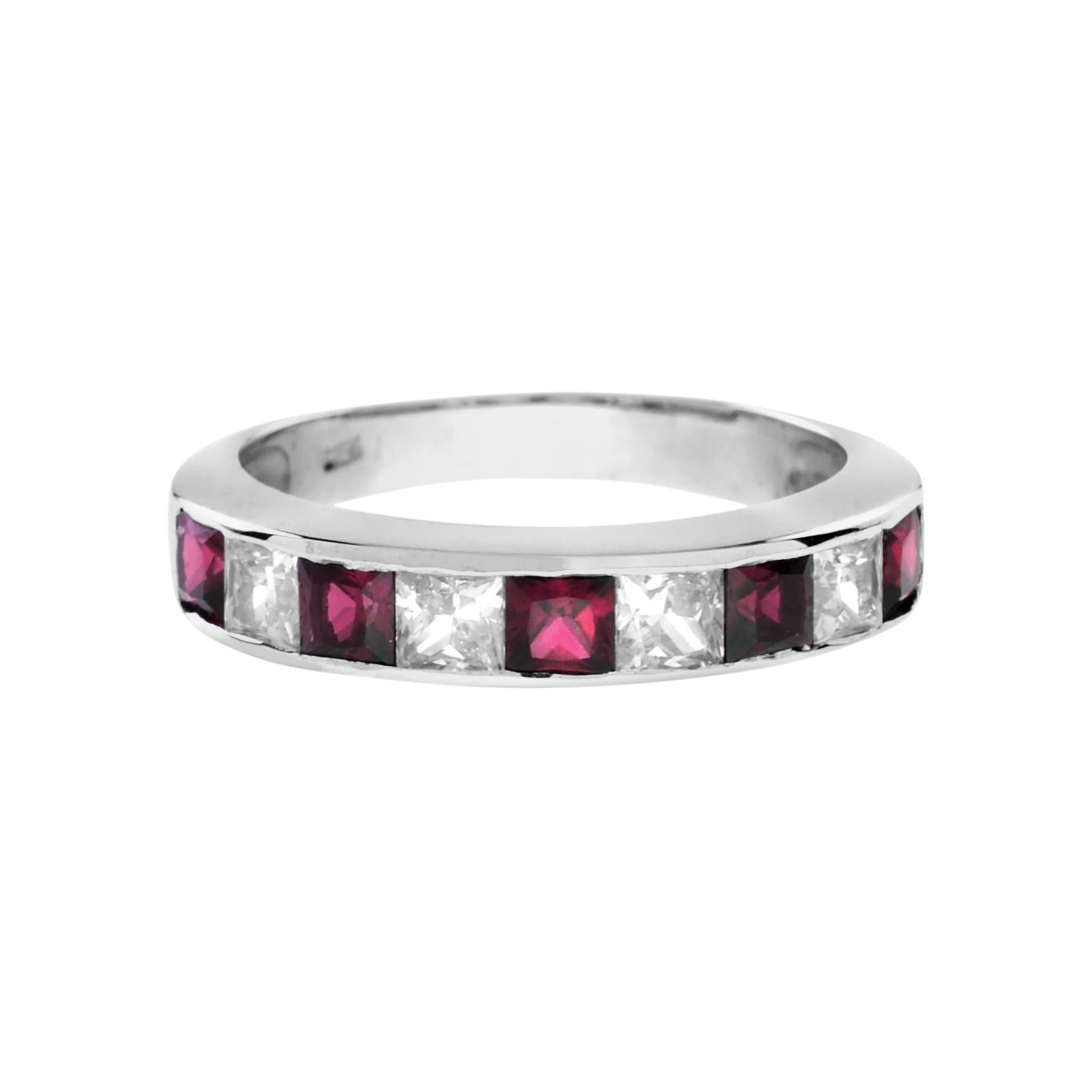 Fabulous square rubies and dazzling diamonds alternatively adorn this channel set half eternity band. The red rubies and white diamonds exude a stunning contrast. 14K White Gold Ring.
Ring Information
Style: Art Deco
Weight: 5.46 g. (approx. in