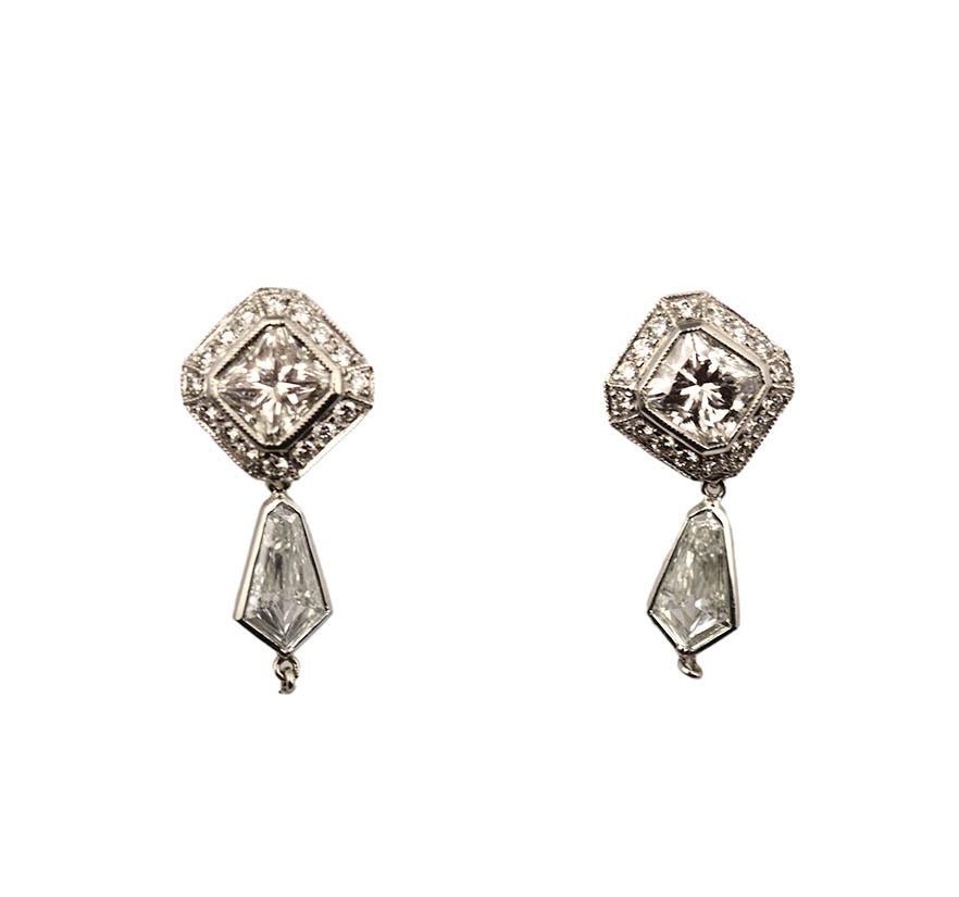Style: Drop Earrings

Metal: Platinum

Metal Purity: 950

​​​​​​​Main Stones: 4 Stones

Main Stones Cut: Square Radiant

Main Stone Total Carats Weight: Approx.  1.01 tcw​​​​​​​

Total Stones Carat Weight: Approx 6 cts

Earring Length:  approx. 1.5