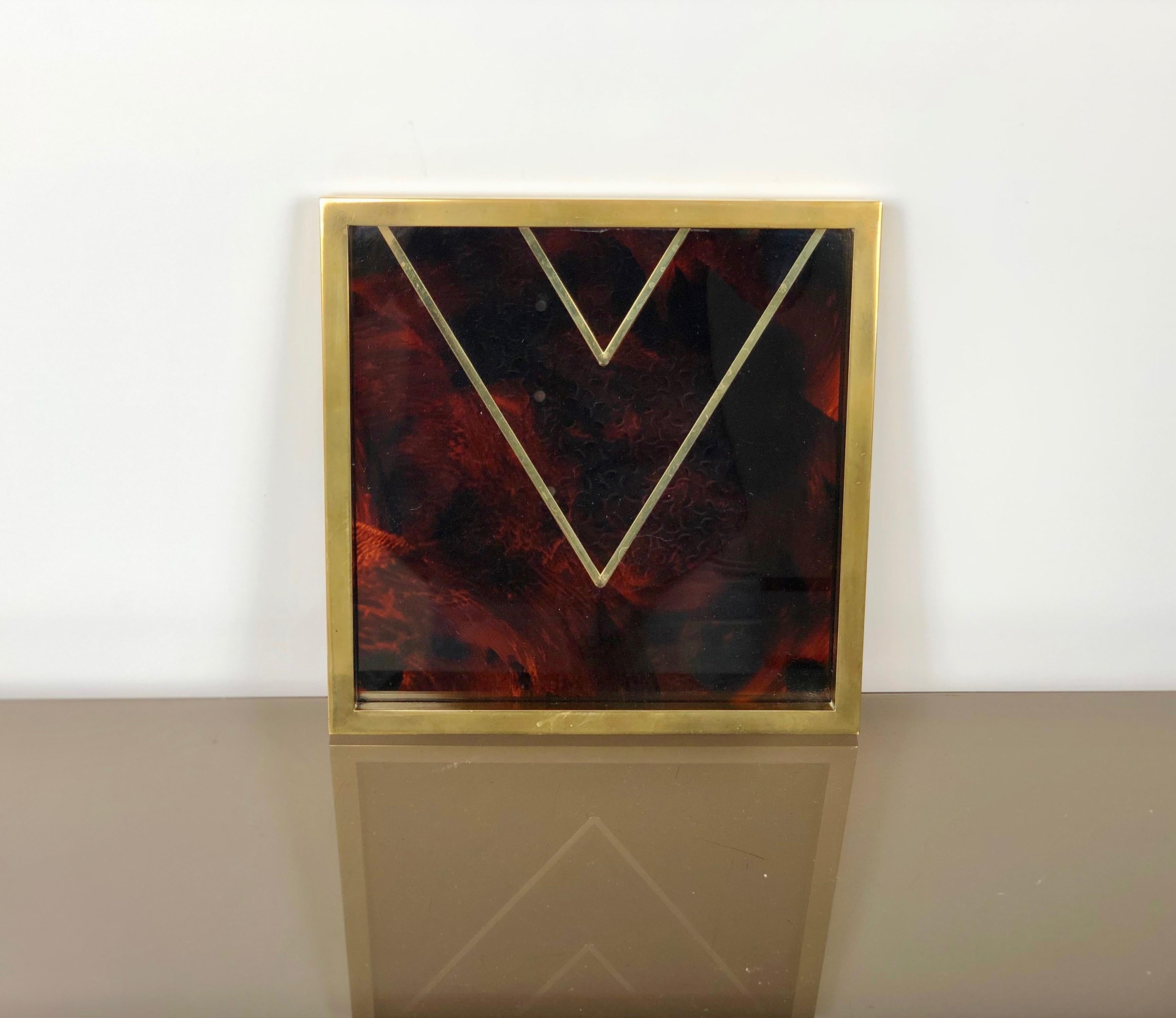 Square tray with faux tortoise pattern in glass and plexiglass/Lucite with diagonal lines in brass. By the Italian designer Romeo Rega - 1970 circa. 

Conditions are good, some sign of the time on the brass as the photos show.