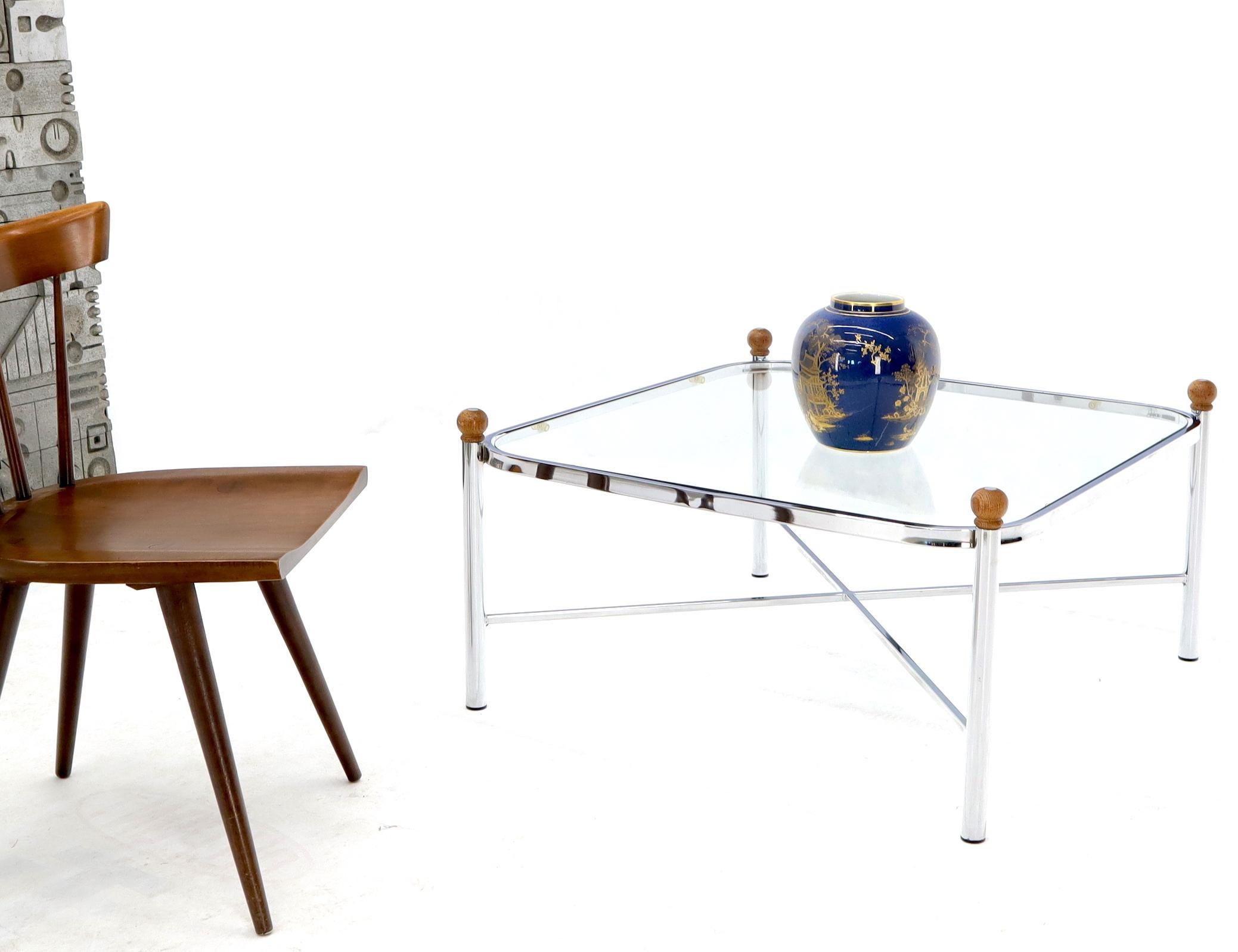 Mid-Century Modern chrome base glass top square coffee table.
 