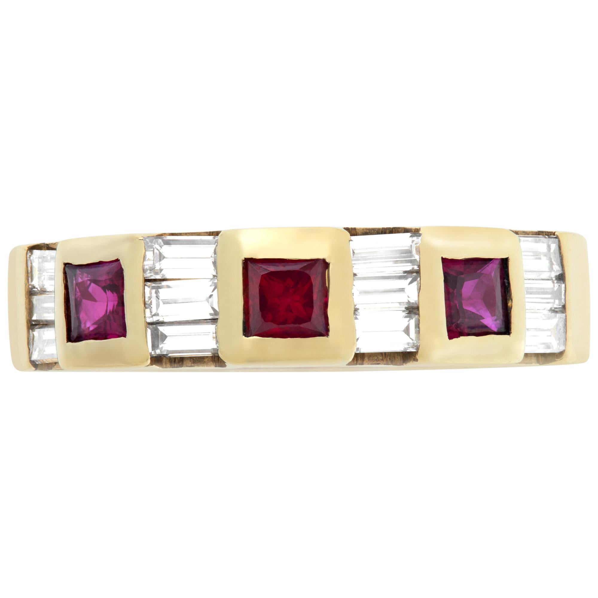 Square beveled ruby and tapered baguette diamonds, semi eternity ring, channel set in 18K gold. Total diamonds approx. weight 1.00 carat, estrimate G-H color, SI clarity. Width: 5mm. Size 6.25This Diamond/Ruby ring is currently size 6.25 and some