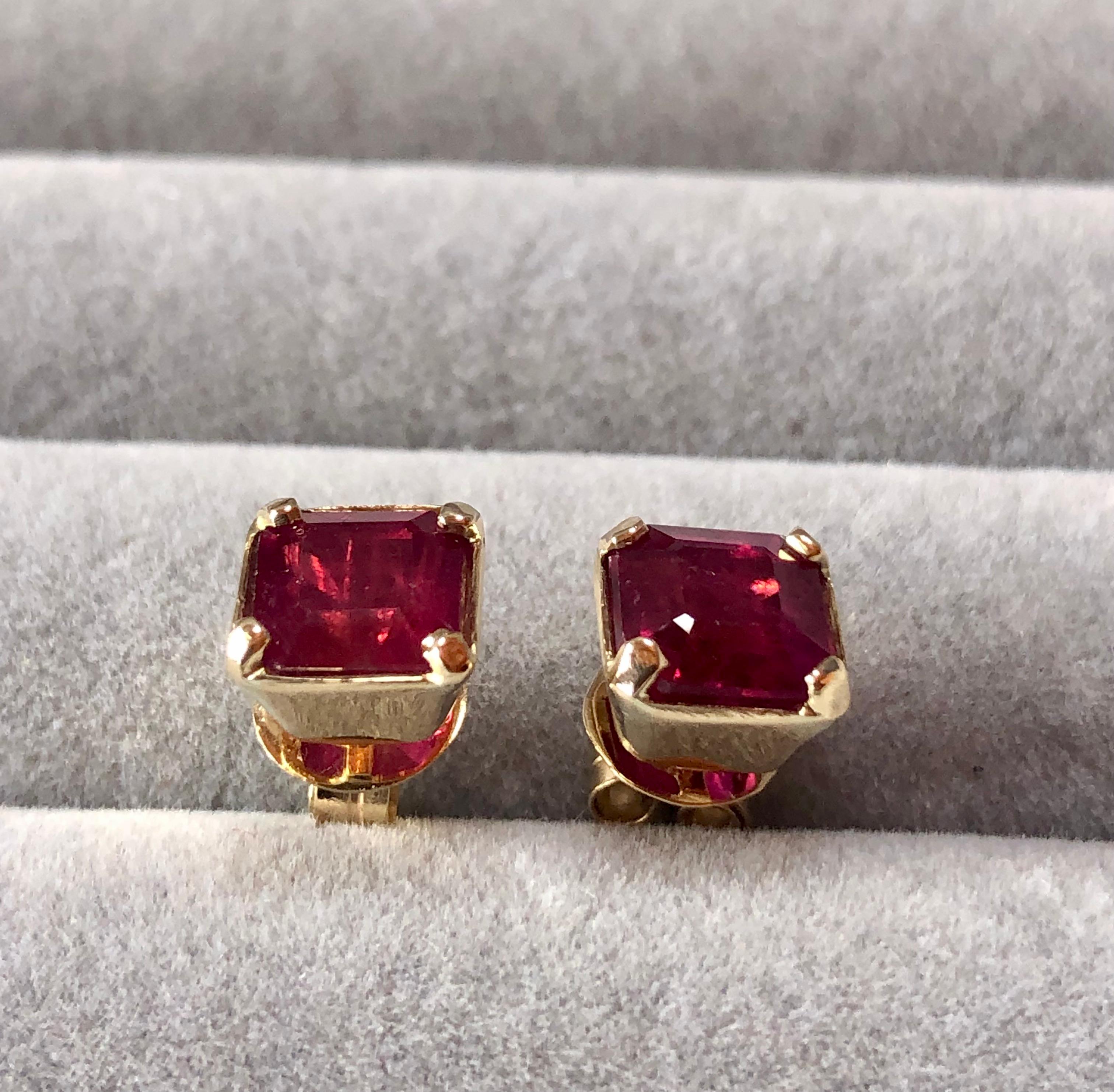 A sweet estate square ruby studs with mega sparkle, these Approx. 4.00-carat ruby 18k yellow gold earrings are crafted with two  7.6 x 7.5mm square-shaped, glass-filled rubies treated in a 4-prong square box setting 18K yellow gold weight 3.8g. Push