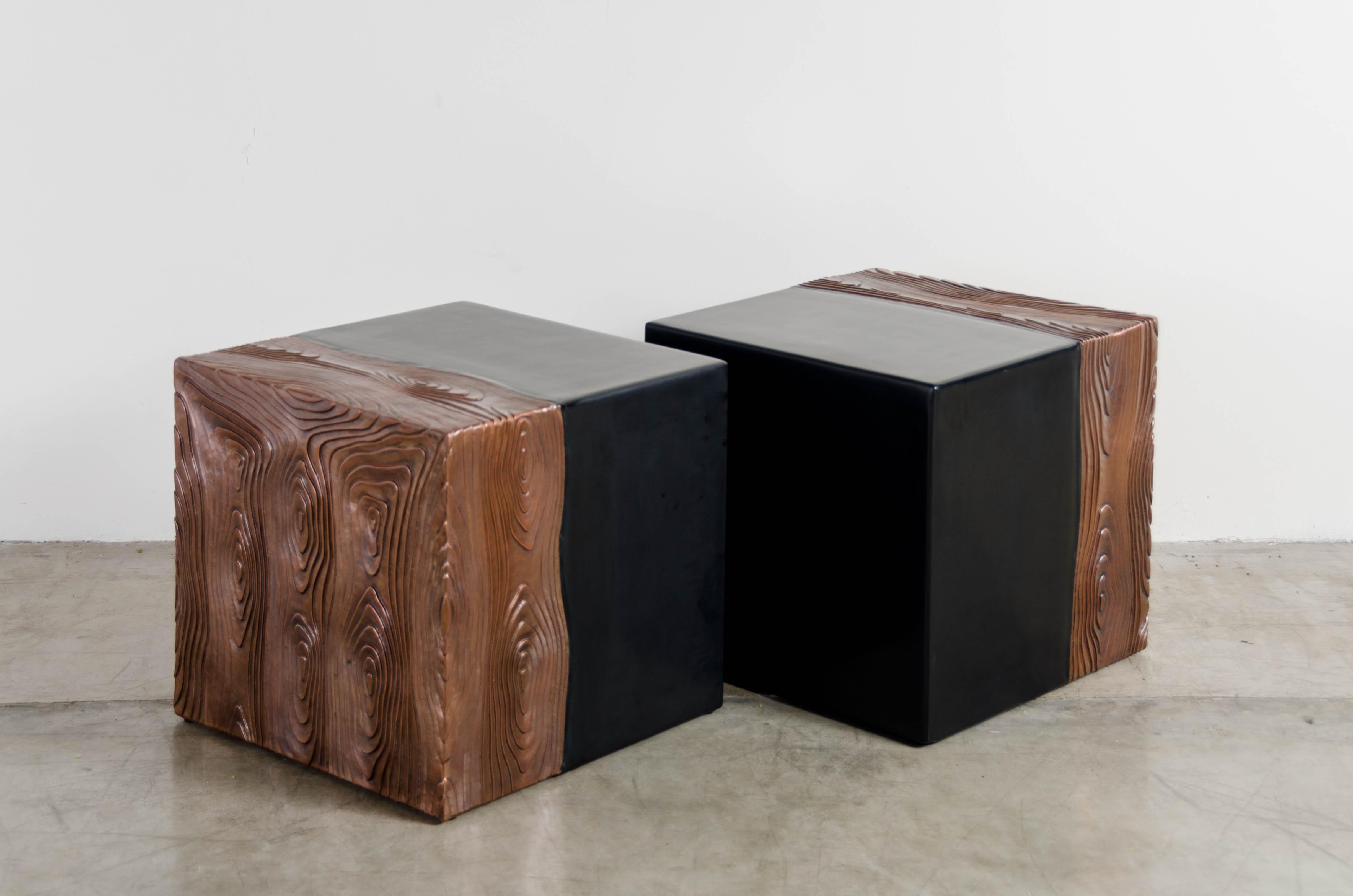 Square seat with woodgrain design
Black lacquer
Antique copper
Hand repousse
Limited edition
Each piece is individually crafted and is unique.

Repousse´ is the traditional art of hand-hammering decorative relief onto sheet metal. The