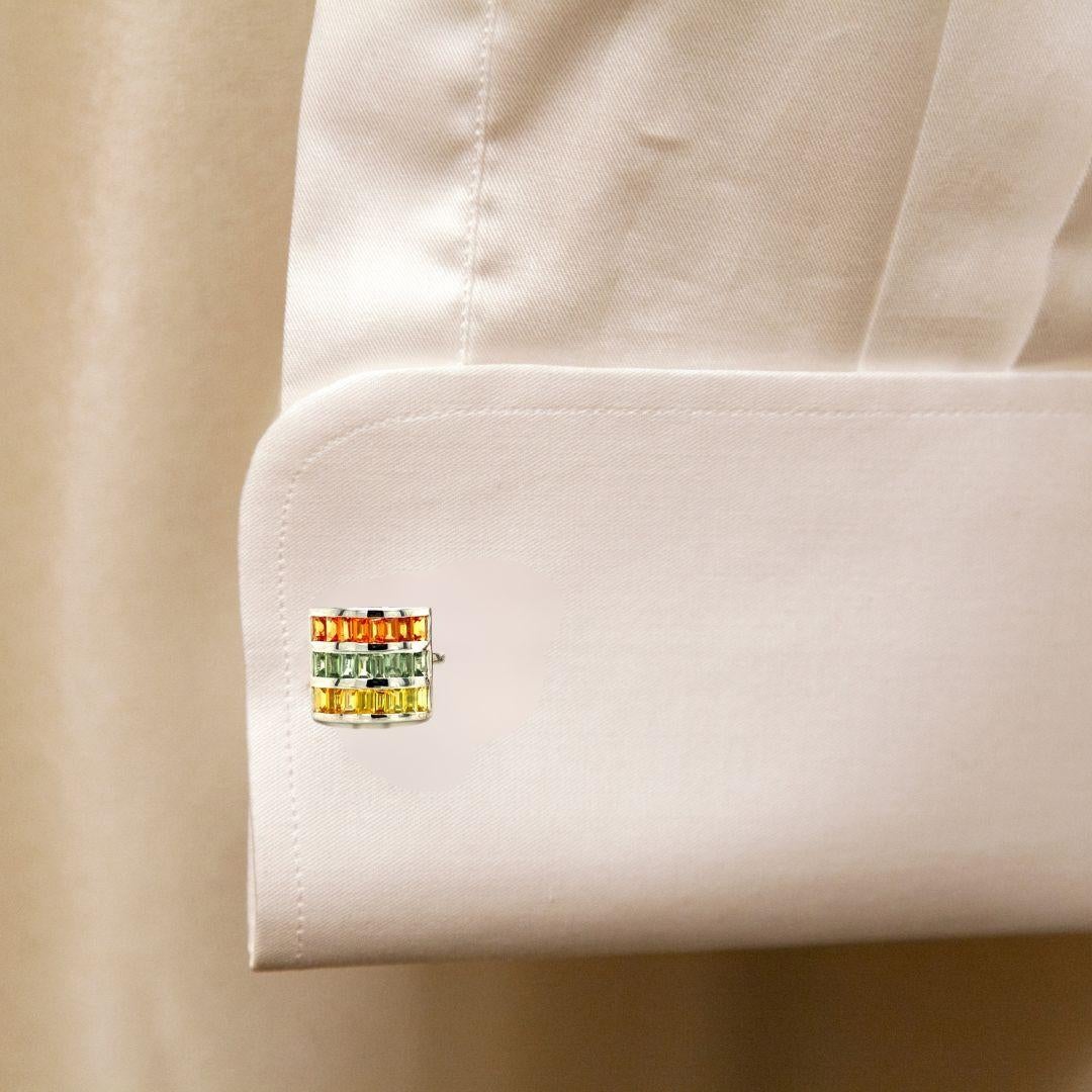 These Square Shape Multi Sapphire Cufflinks in 925 Sterling Silver are elegant accessories crafted with natural multi sapphire which calms the senses and increases concentration.
These are used for securing shirt cuffs and makes a bold fashion