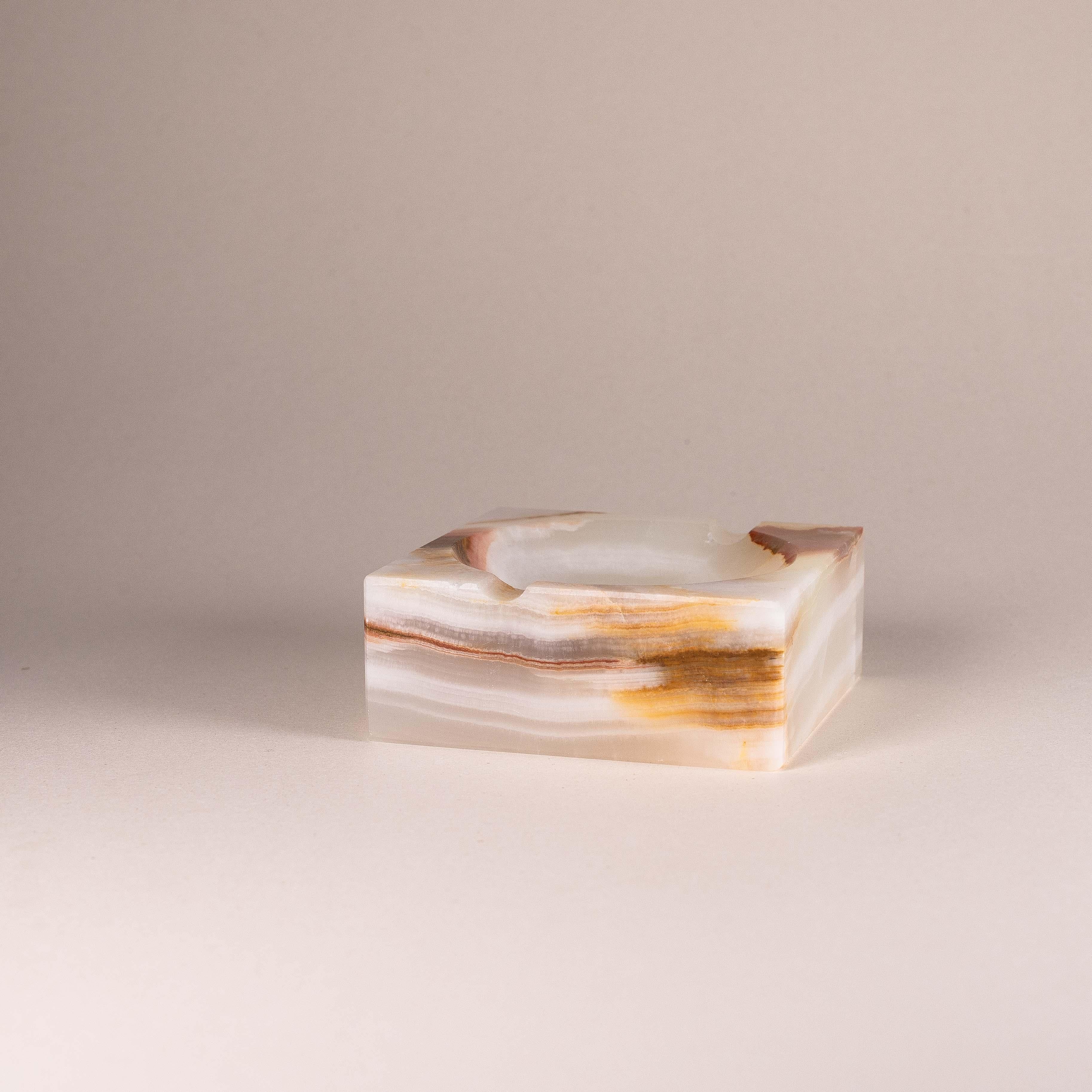 Square-Shaped Onyx Paperweight or Ashtray, France 1970s

Very elegant with its minimal design !

Can be used either as a paperweight, or as an ashtray, a decorative bowl for small objects, jewels etc.

Beautiful hues of pink, brown, yellow and white