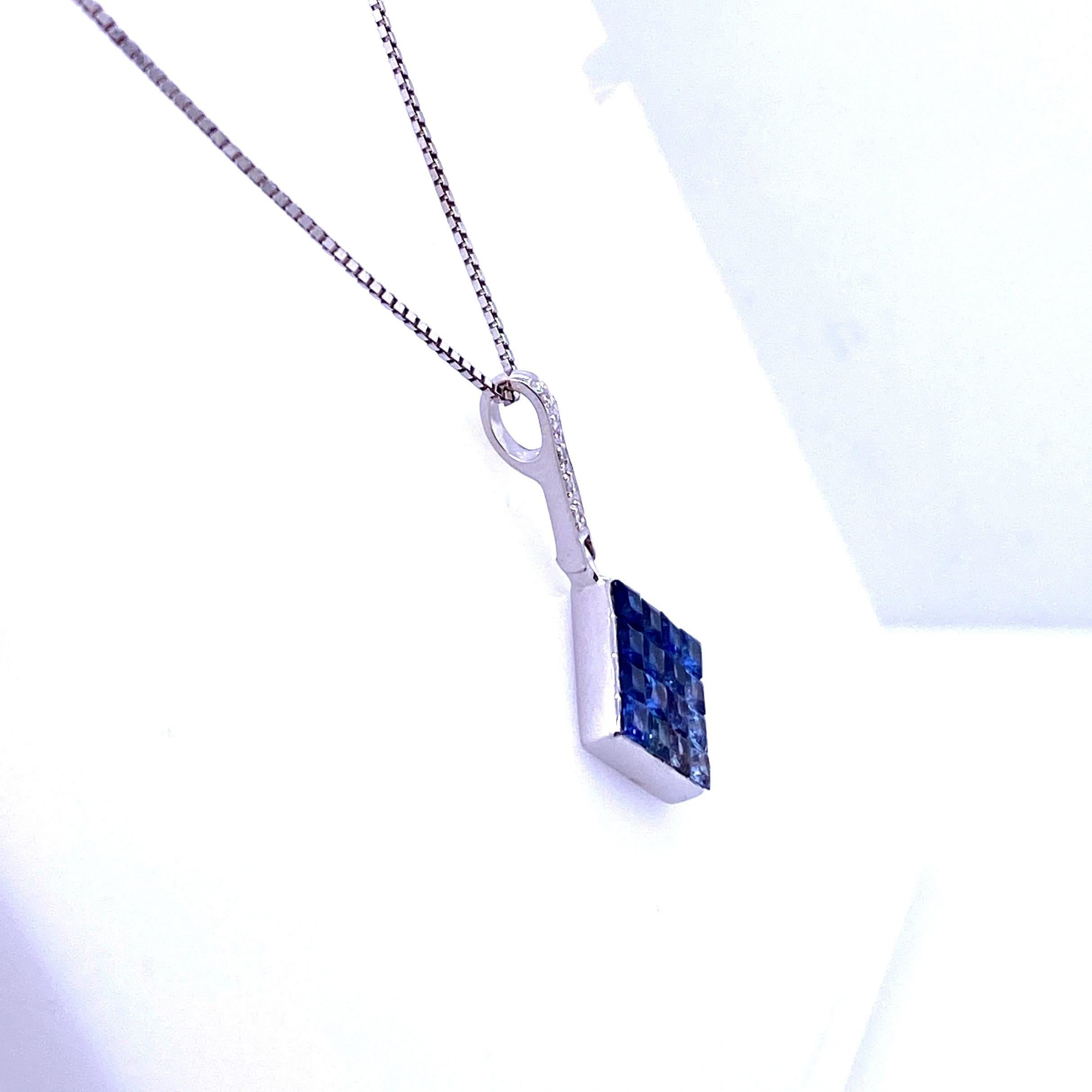 One 14 karat white gold (stamped 14K AV) square shaped pendant measuring 15mm x 15mm with a bail measuring 0.5