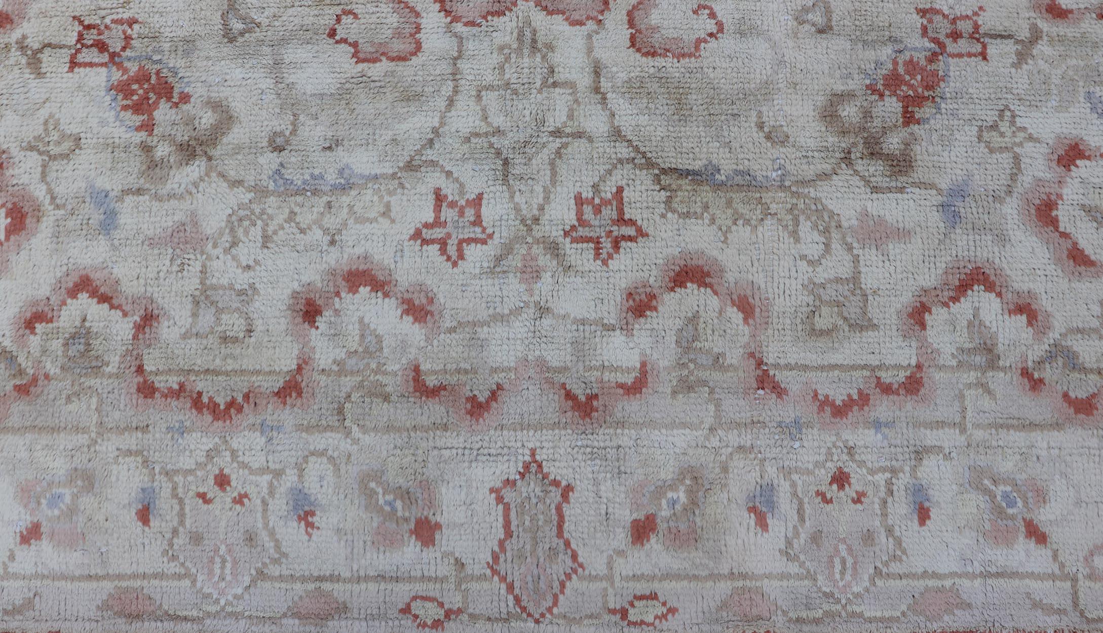 Measures: 7' x 8'7

Hand Knotted in Turkey, this square-shaped vintage Oushak is characterized by a comely and highly representative Oushak composition. Building on traditional designs, this marvelous Turkish rug features an all-over floral design