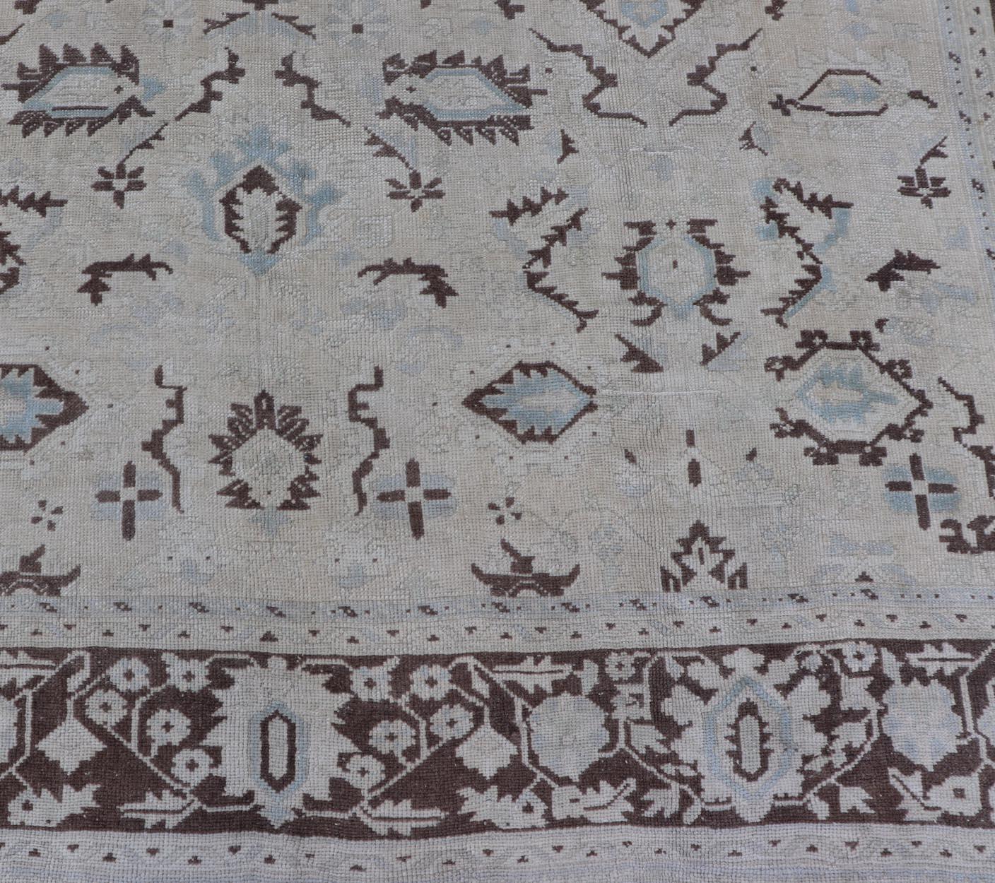 20th Century Square Shaped Vintage Turkish Oushak Rug with Brown, Lt. Blue and Cream Tones For Sale