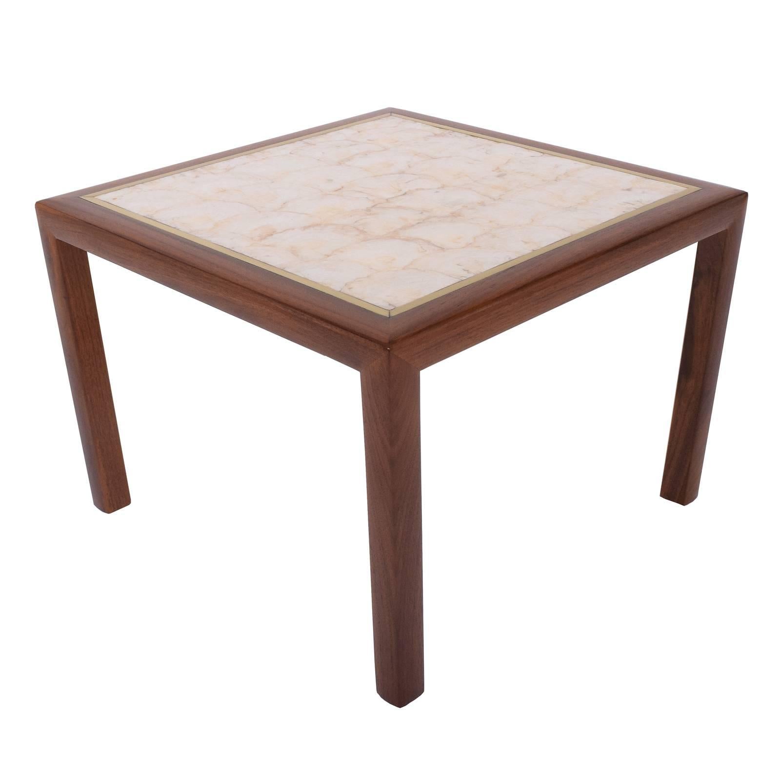 Nice quality solid walnut wood frame side table with beautiful pearlized seashell top and brass trim. Likely from the 1960s.