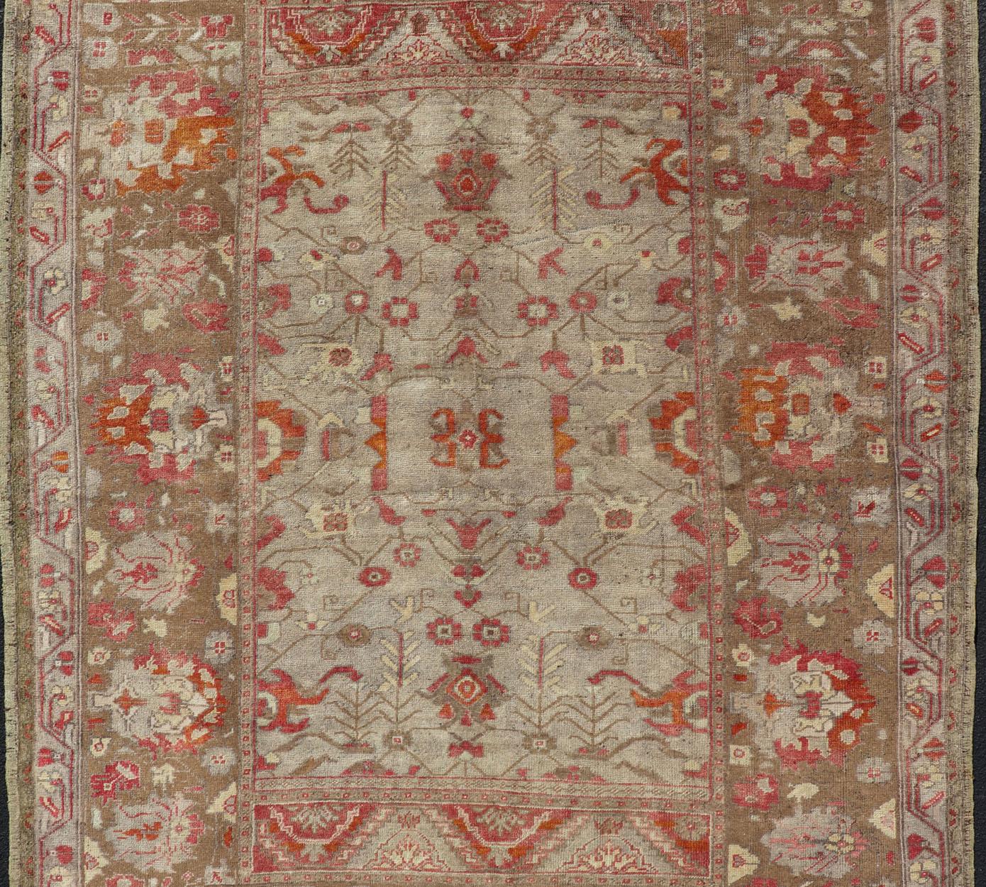 Hand-Knotted Square Size Antique Turkish Floral Oushak Rug in Green, Red Taupe & Tan For Sale