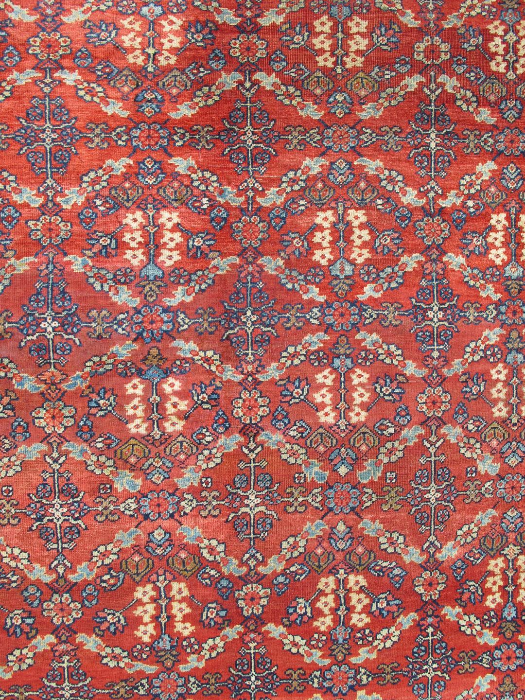 Red background antique Persian Mahal-Sultanabad rug with large flowers, 1920, Keivan Woven Arts/rug /G-0208, country of origin / type: Iran / Sultanabad, circa 1920

Measures: 9'0 x 9'10  

This antique square sized Persian Mahal Sultanabad carpet