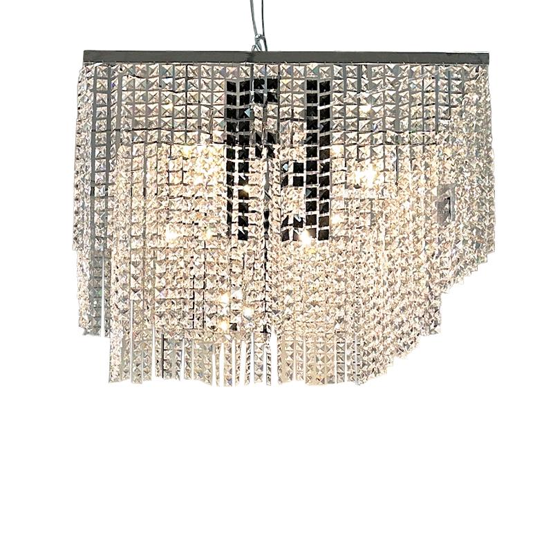 One of the most Iconic pieces from Fendi Casa - “Crystal light” chandelier.  This pair of stunning Swarovski Chandeliers are made by the famous  design house Fendi for Fendi Casa.  The chandeliers are square with two tiers of thousands of clear