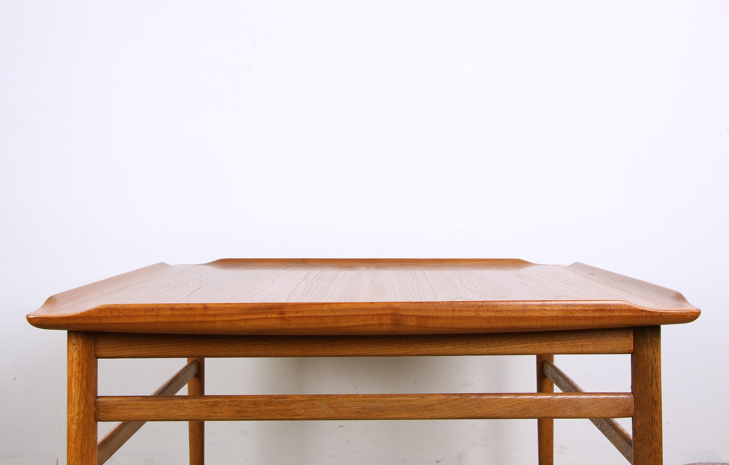 Scandinavian Modern Square Swedish coffee table. Teak and solid oak base by Folke Ohlsson/Tingstroms