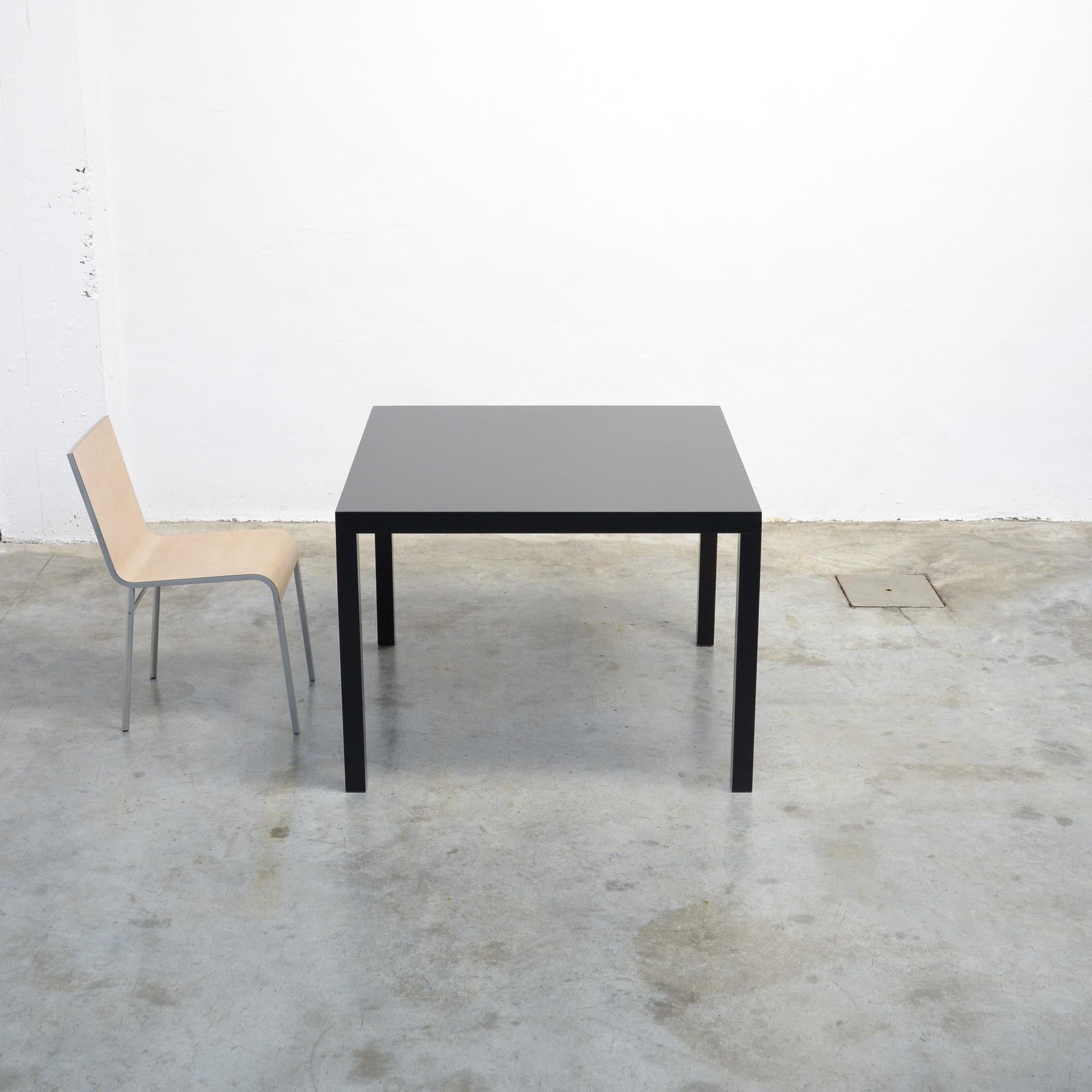 This square table T88A, black edition was designed by Maarten Van Severen and manufactured by Top Mouton in the late 1990s.
The table is made of black lacquered aluminium. It is a rare early edition, only produced in the Top-Mouton workshop, under