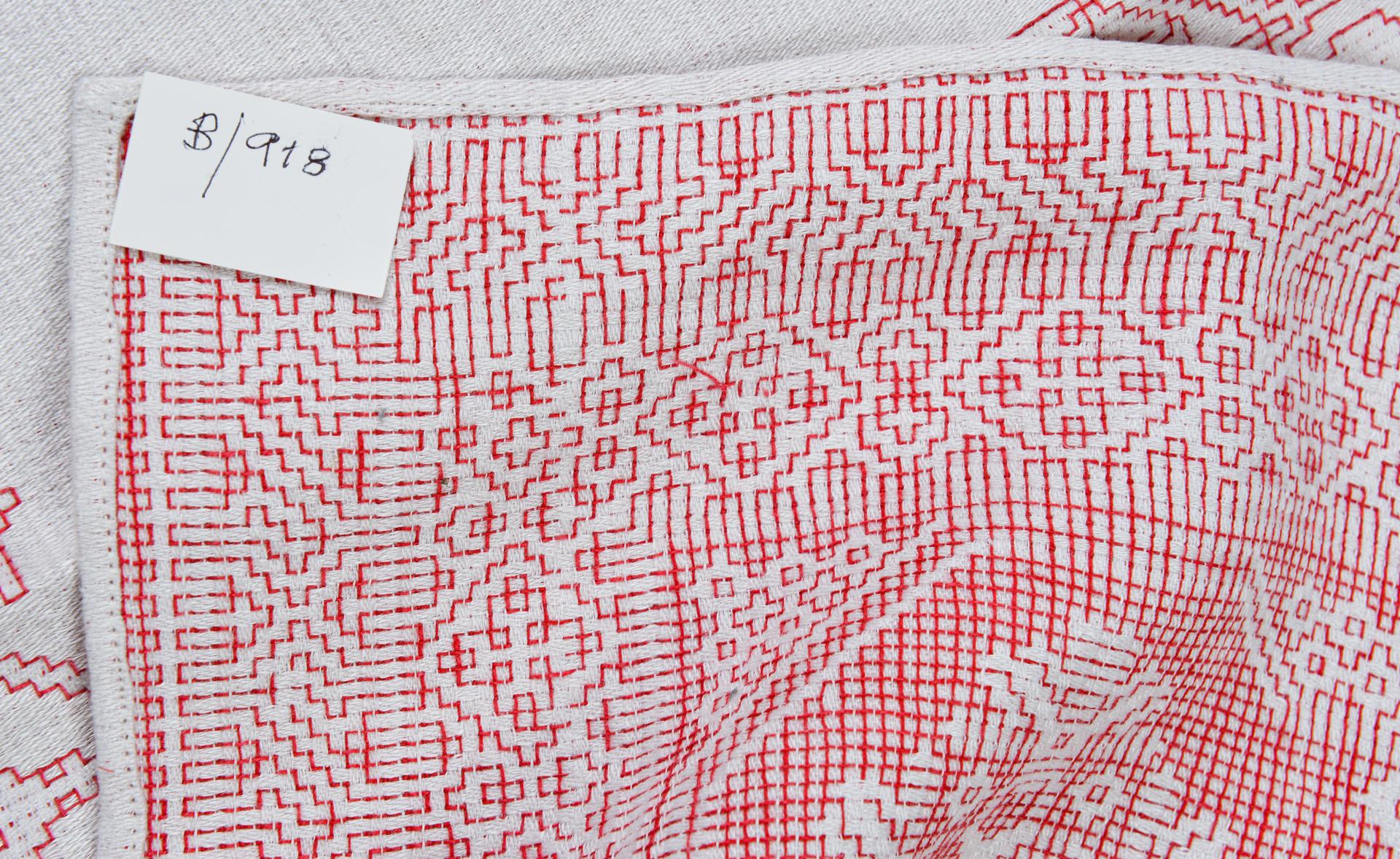 Nice square table cloth. It comes from a Dutch trousseau and is hall stitched with a nice simple red embroidery.
It also looks good placed diamond-shaped on a table.