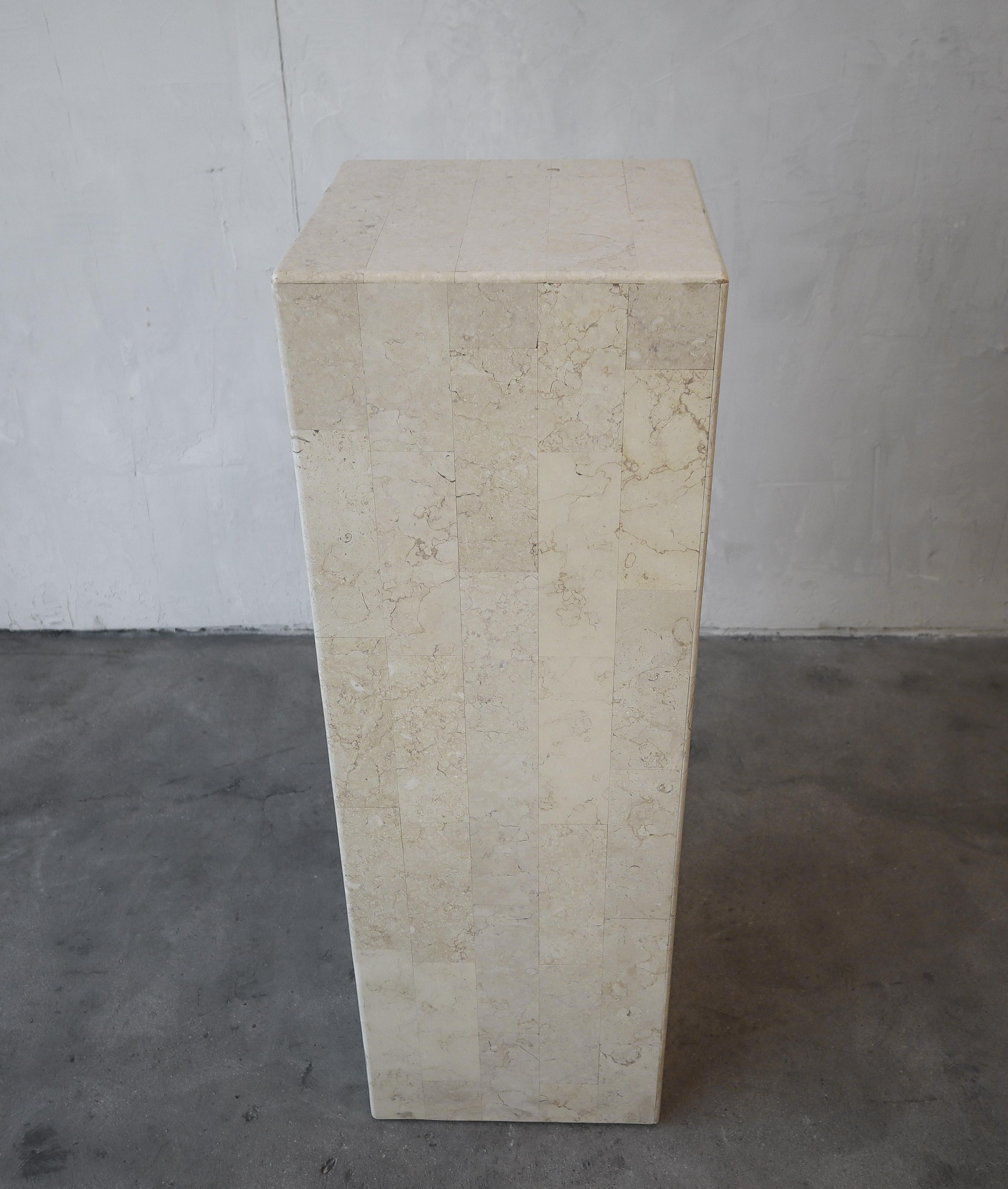 Clean and simple display pedestal. Pedestal is constructed of tessellated cream marble.

The pedestal is in excellent condition with no imperfections to be noted.

**2nd Pedestal available in a slightly darker color (slightly more beige).