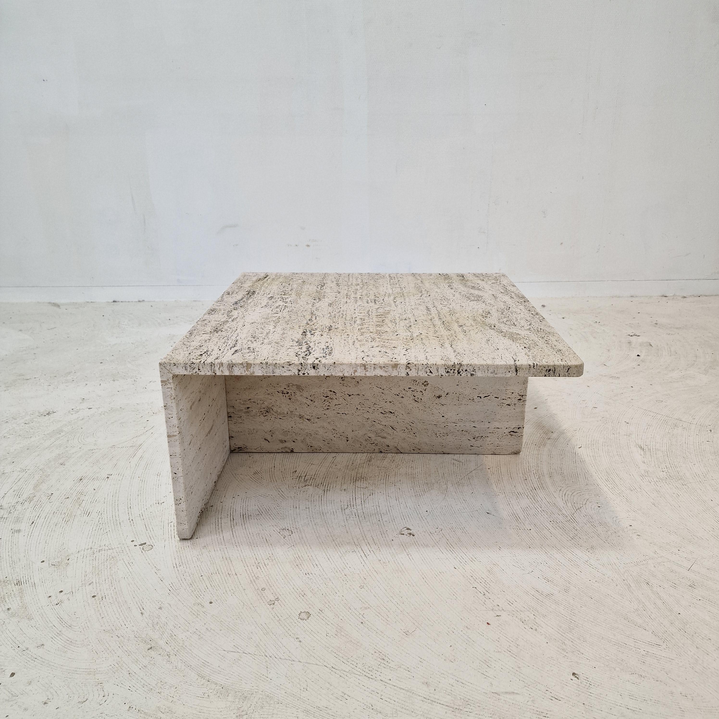 This very nice coffee or side table is made by the Italian company Up & Up in the 1970's.

It is handcrafted out of beautiful rough travertine. 
Please take notice of the very nice patterns and the round finishing of the corners.

It has the normal