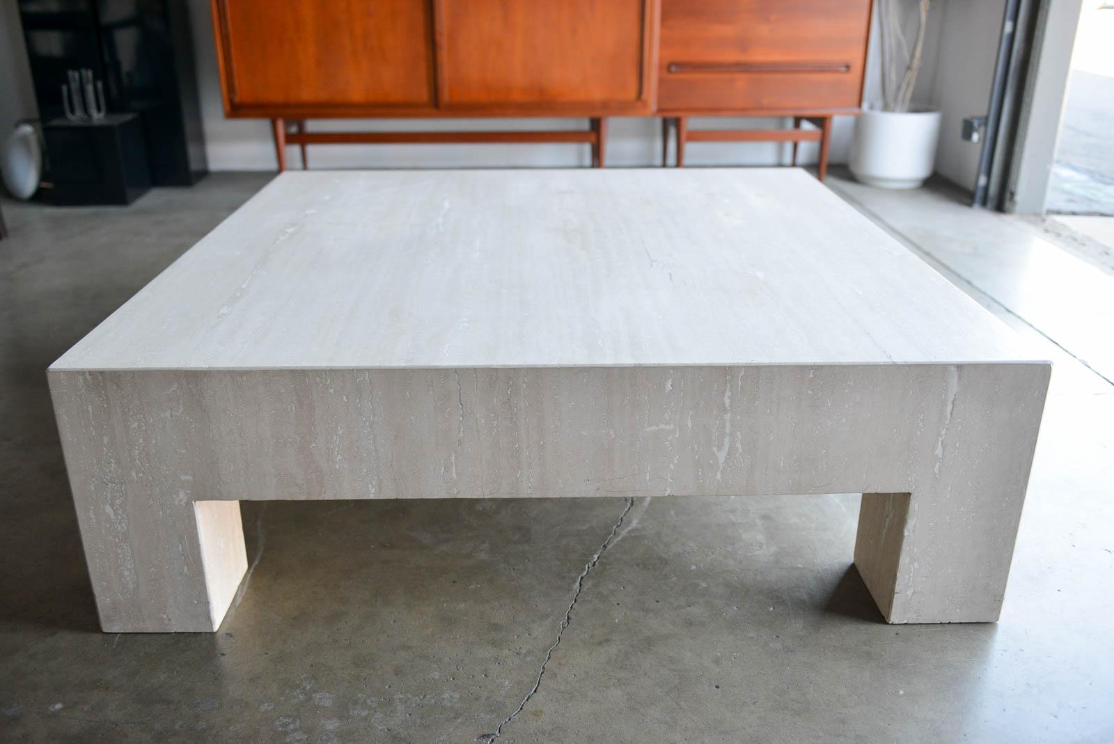 Square travertine coffee table, circa 1980. Very good vintage condition, no cracks. Slight wear as shown. Could be used indoors or outdoors on patio.

Measures: 48