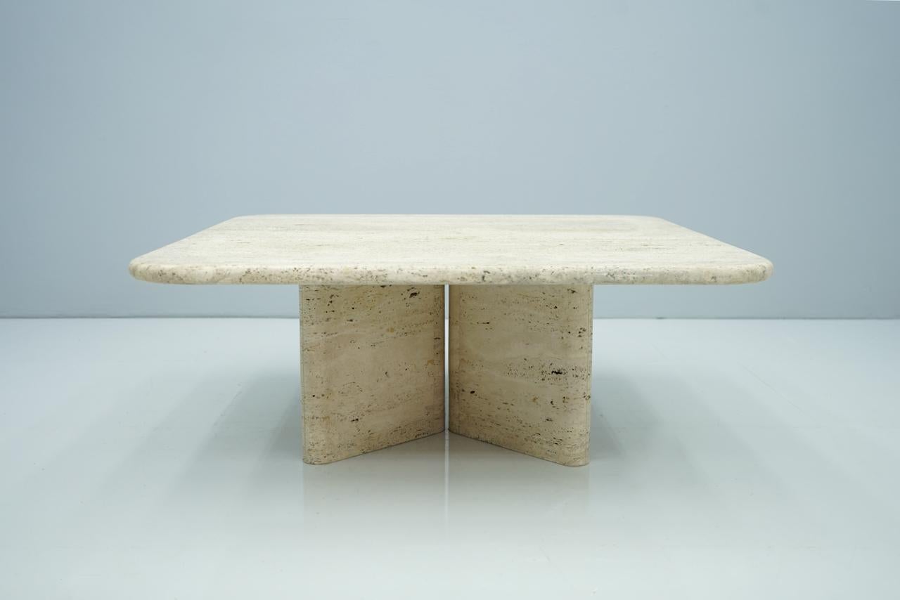 Square travertine coffee table, Italy, 1970s. 

Very good condition.