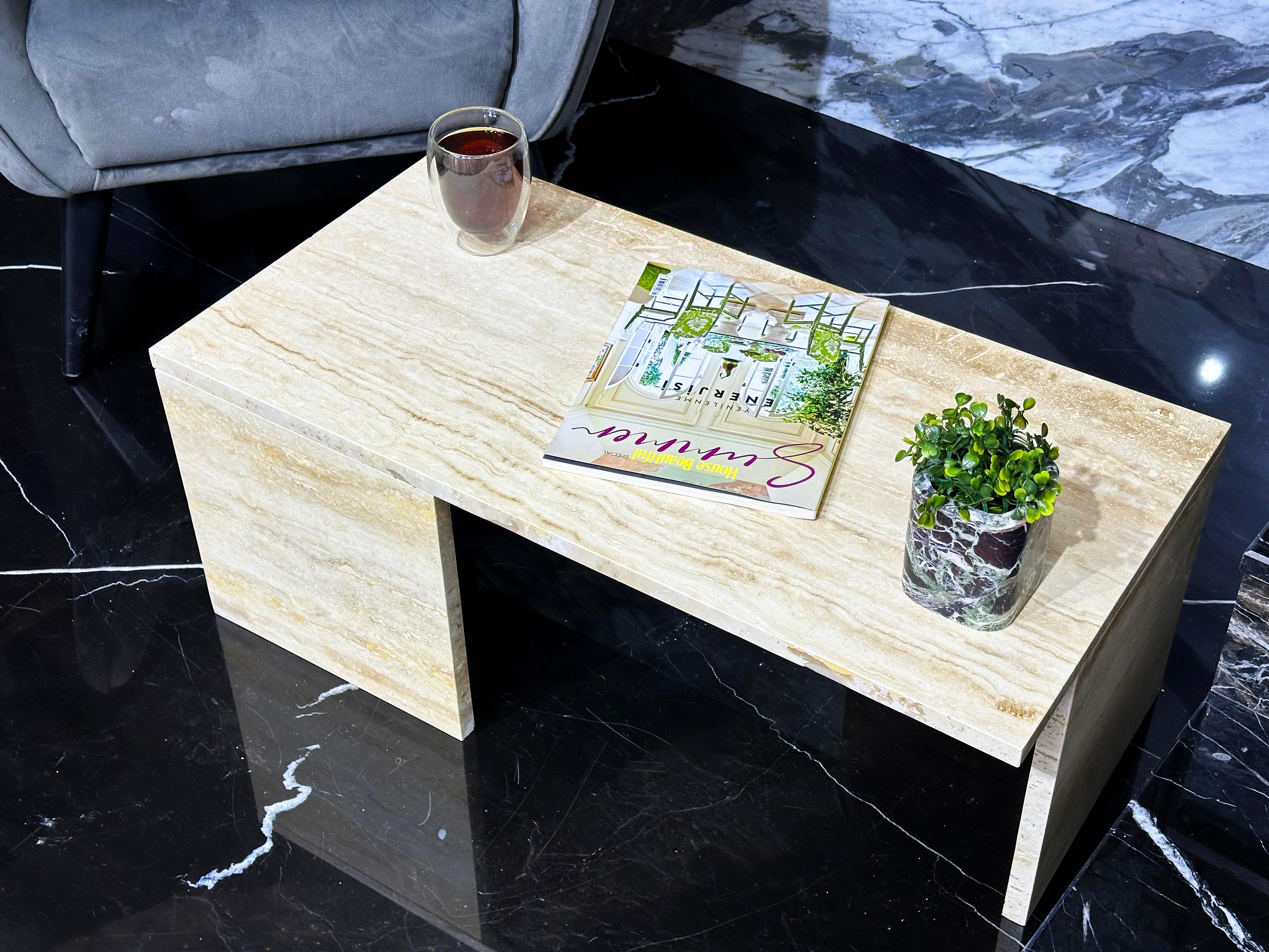 COUCHTISCH AUS TRAVERTIN/MARMOR

Art von Marmor: Travertin
Abmessungen: 31