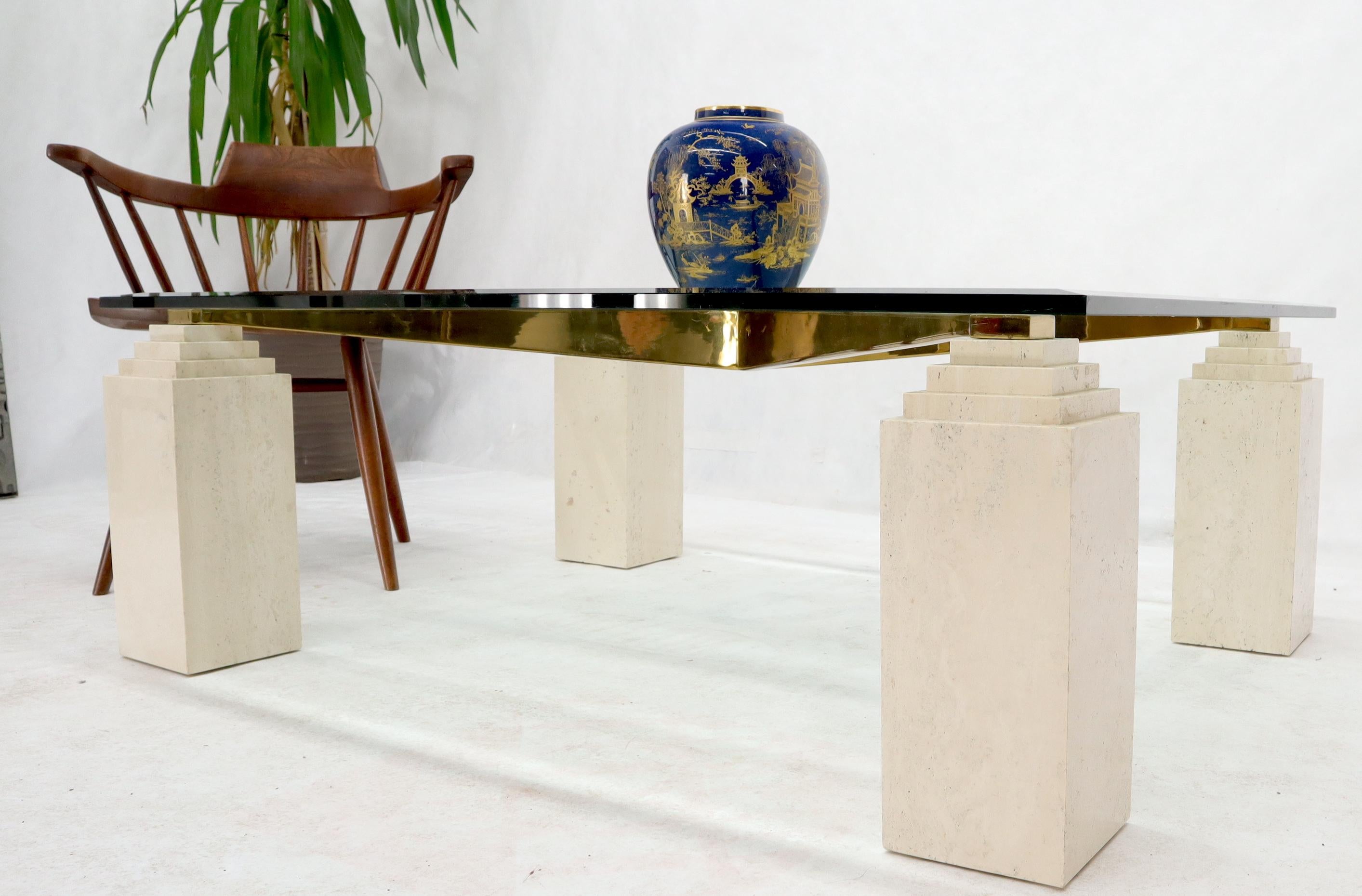 Mid-Century Modern heavy grade materials square travertine legs glass top coffee table.