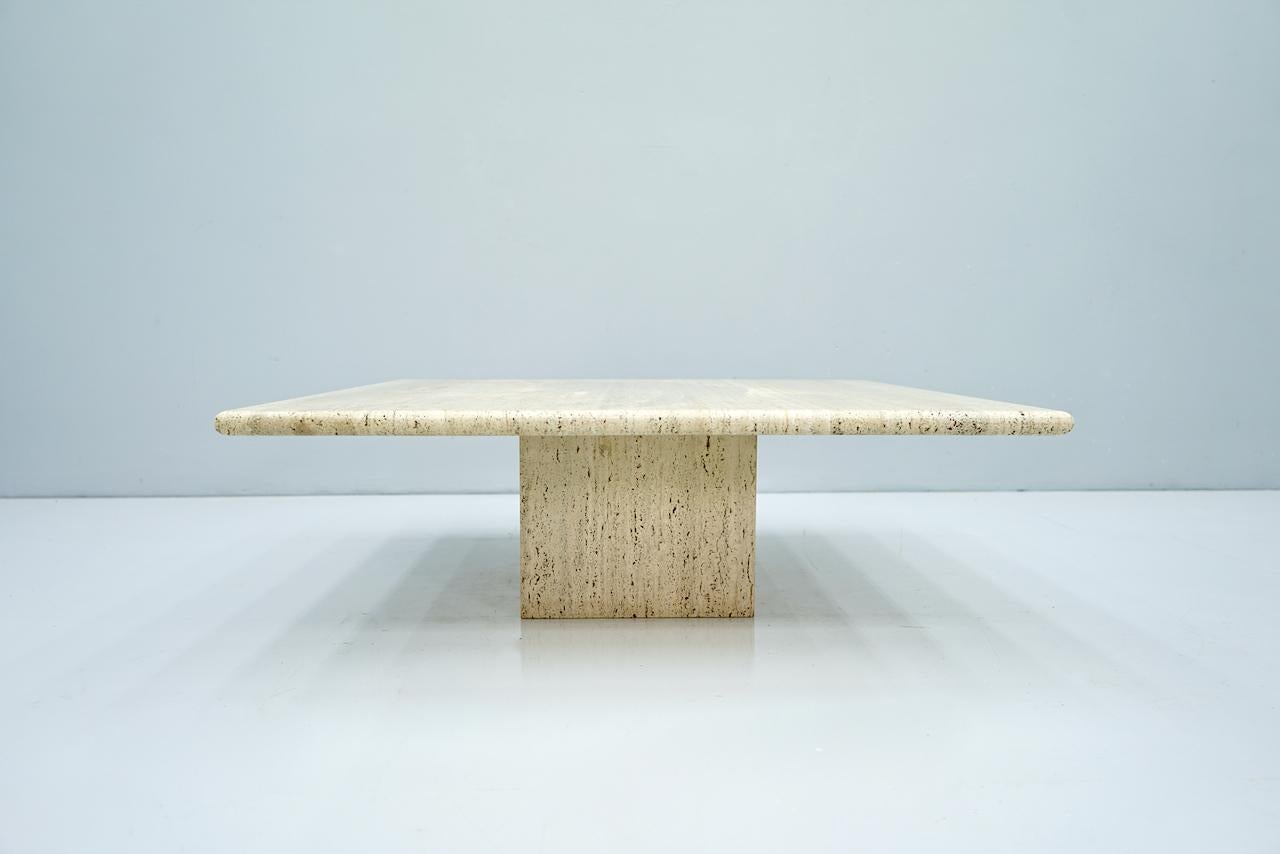 Low coffee table in Italian Travertine stone, 1970s.
Very good condition.
