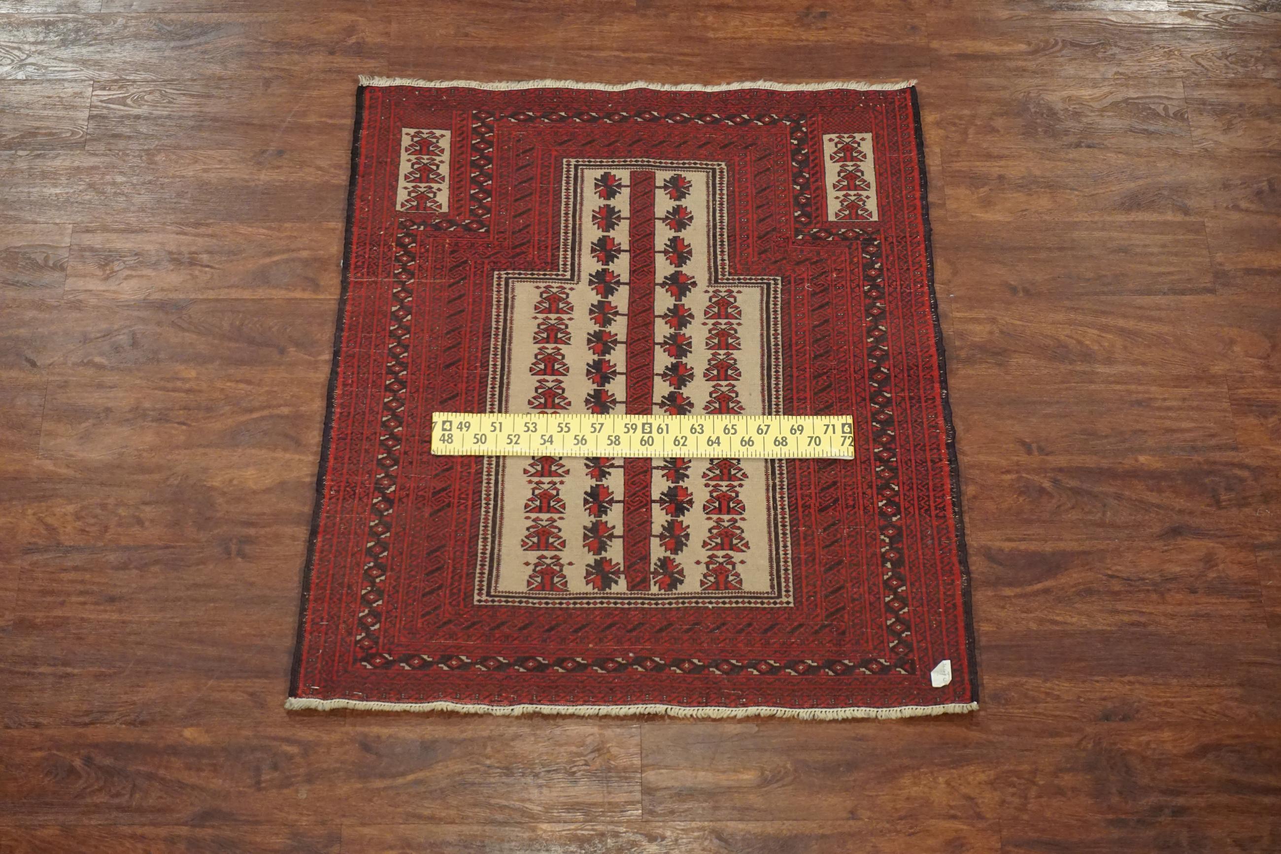 Small square Turkoman rrayer rug in a tribal design,

circa 1960

Measures: 3' 1