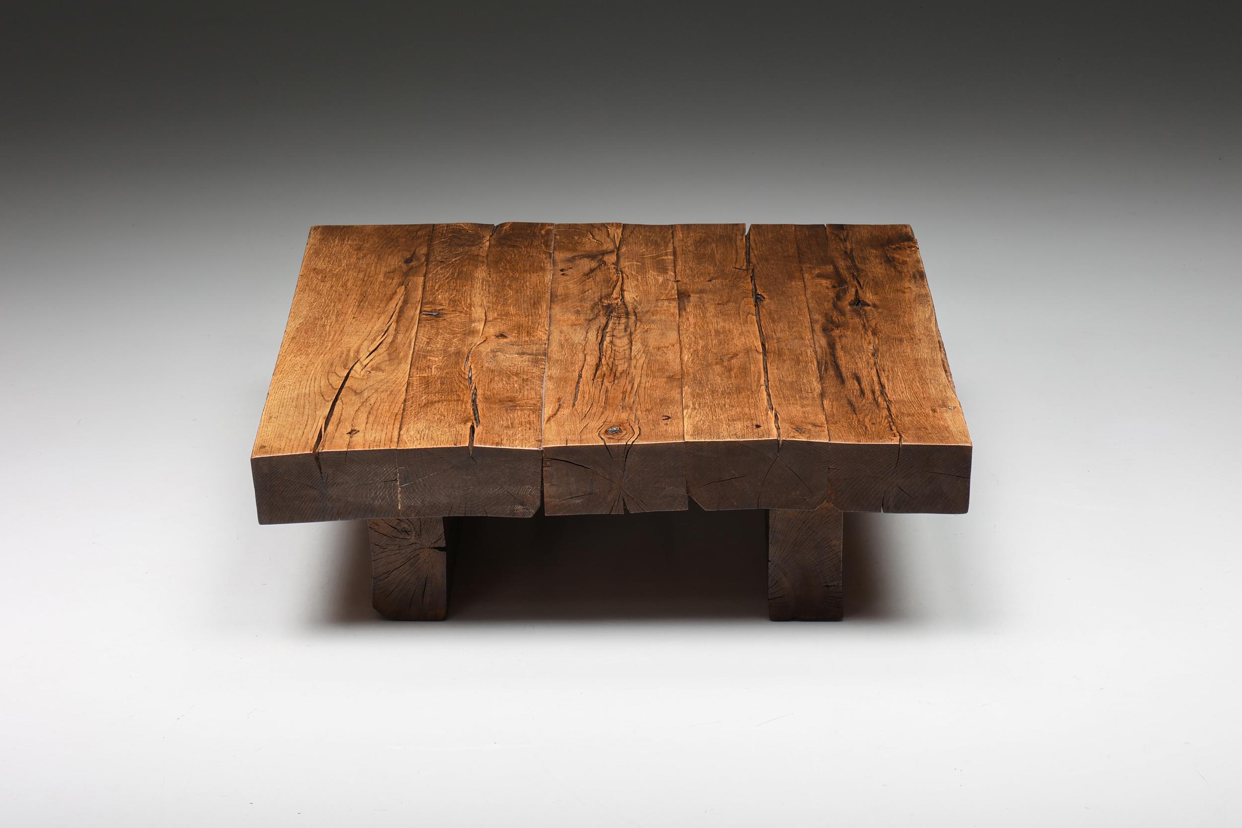 Square Wabi Sabi wooden coffee table, France, 1950's

This rustic square coffee table with a two-legged base is made of solid wood. The square surface provides space for objects like magazines and other curiosities. Can also be used as a side