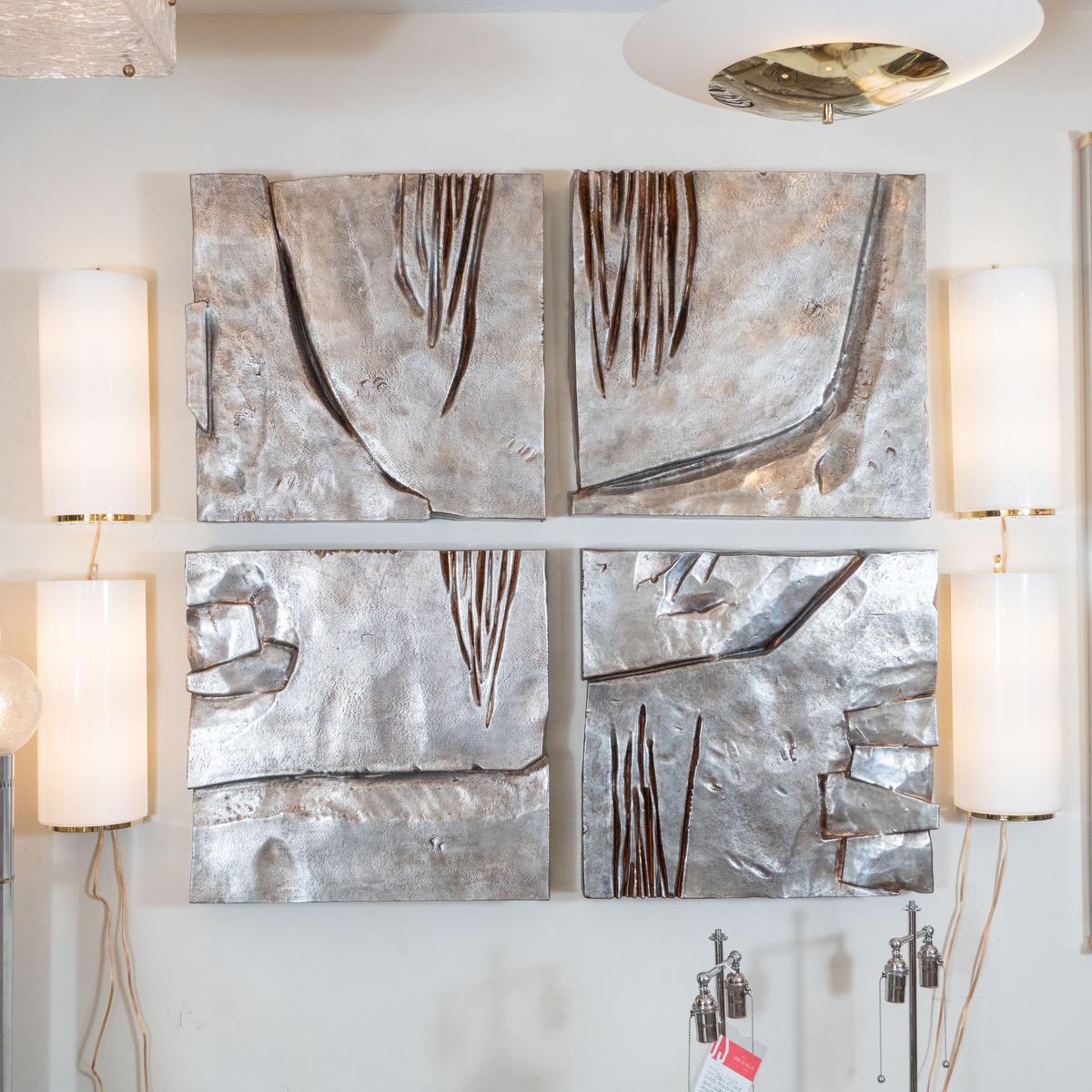 Square wall appliqué/ sculpture composed of metal leaf and cellulose on wood by Nicola Perilli. Panels can be sold individually.