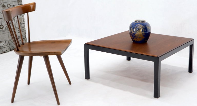 Mid-Century Modern walnut top ebonized base square coffee table. Harvey Probber and Directional influence.