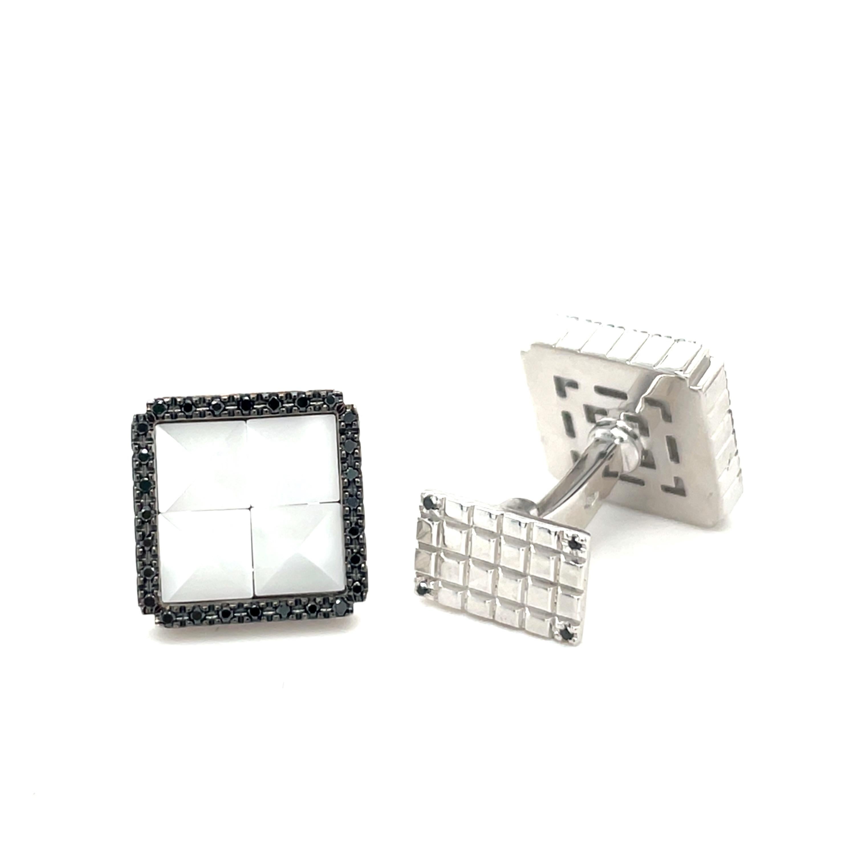 These white gold cufflinks are from Men's Collection. These cufflinks are decorated with black diamonds Diamonds 0.37 ct and white ceramic. The dimensions of the cufflinks are 1.3cm x 1.3cm. These cufflinks are a perfect upgrade to every special