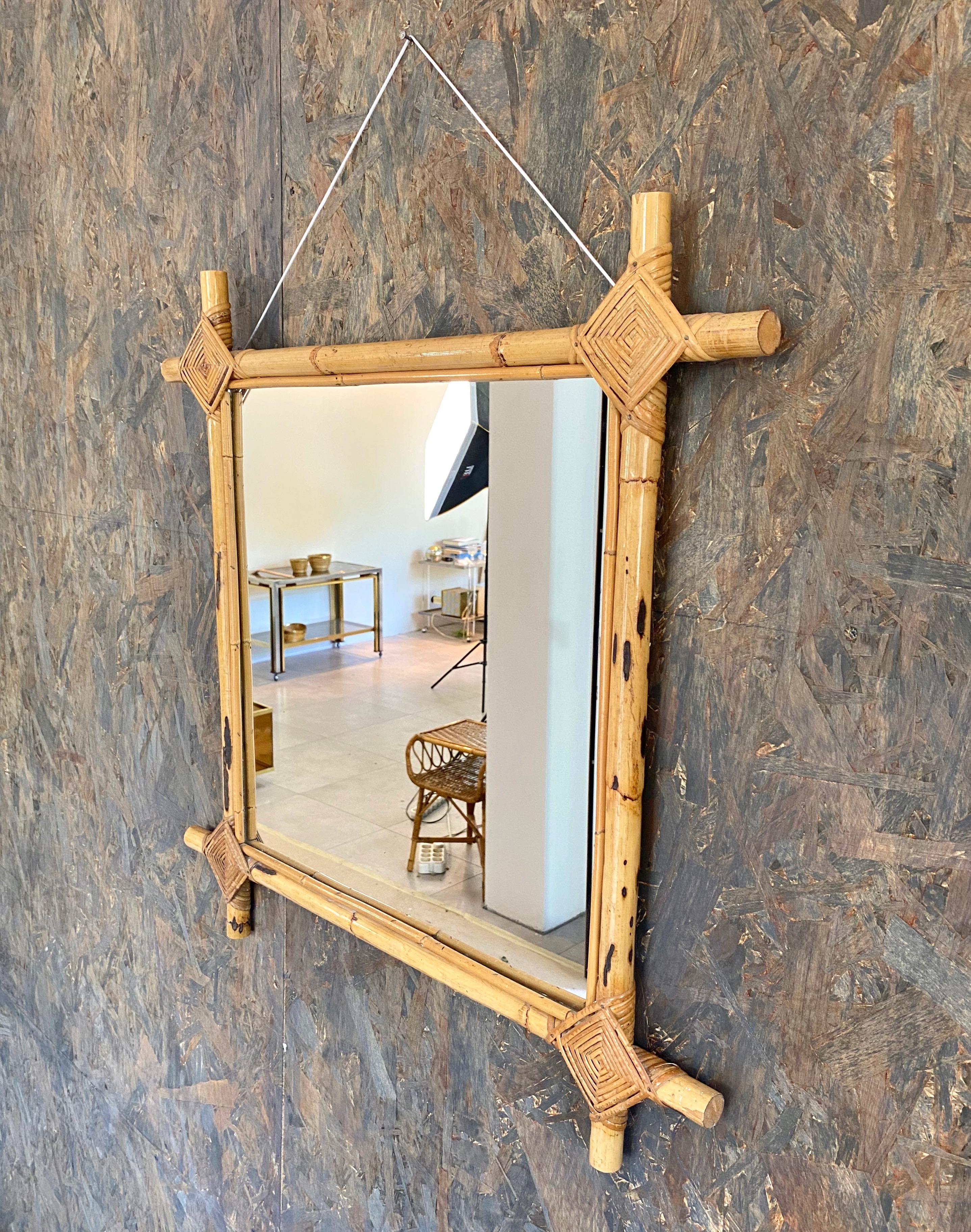 Wall mirror in bamboo rattan with wicker details, squared, made in Italy in the 1960s.