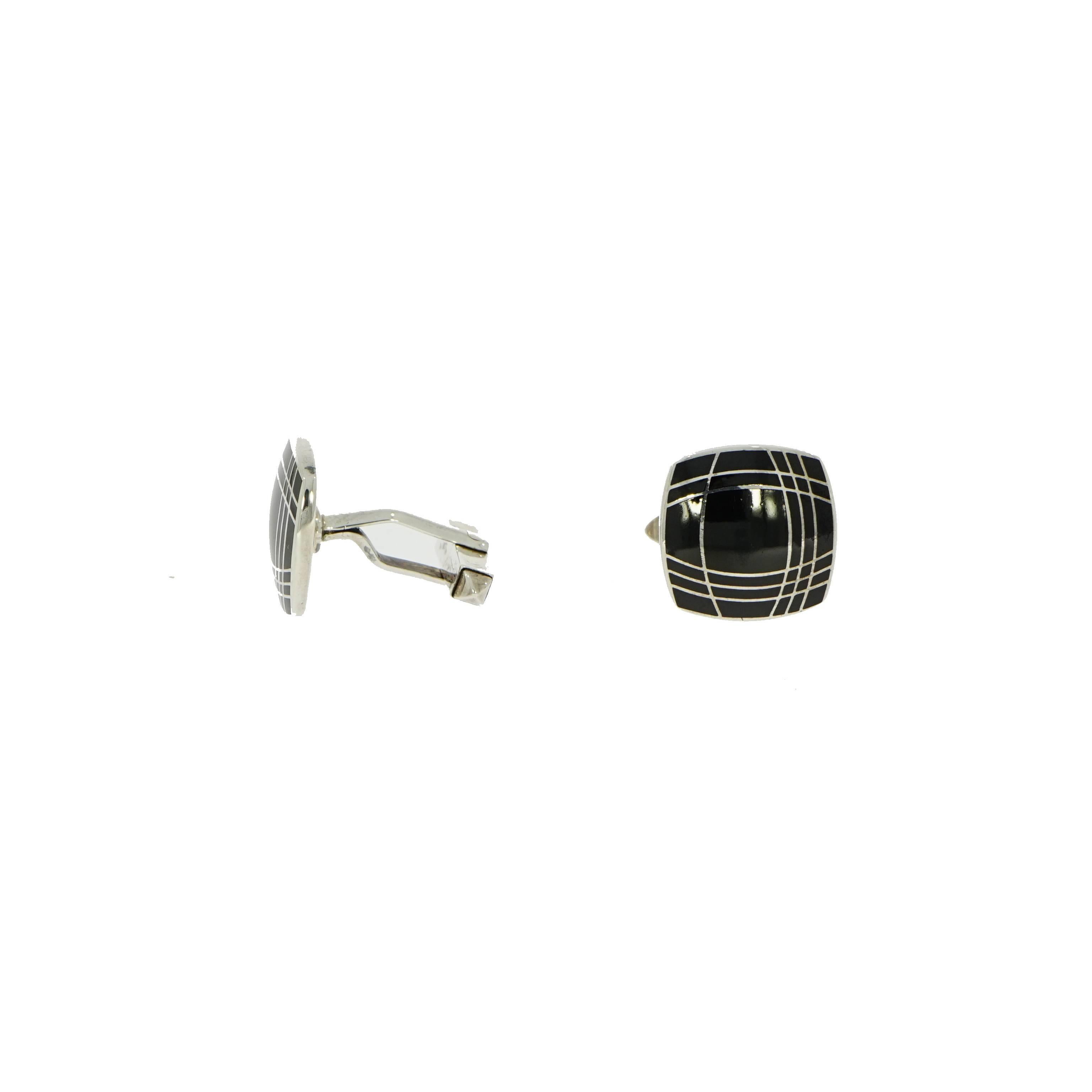 Cufflinks can be worn anytime by anyone and will transmit your style and define your look. 
This stylish and modern black enamel cushion shaped (squared with rounded corners) cufflinks is handcrafted in sterling silver and highlighted with geometric