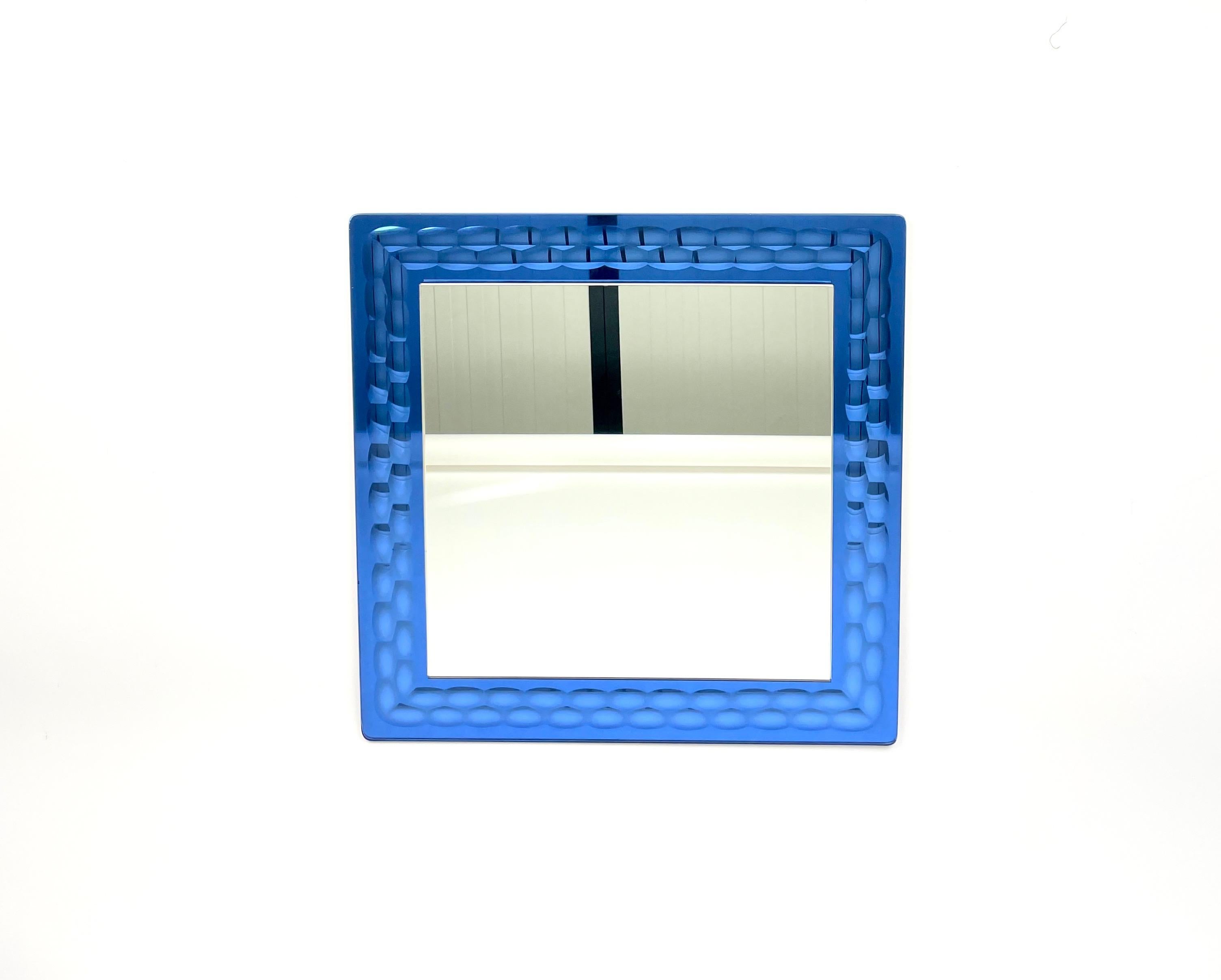 Blue square wall mirror by the Italian designer Antonio Lupi for Crystal Luxor.

Made in Italy in the 1960s.