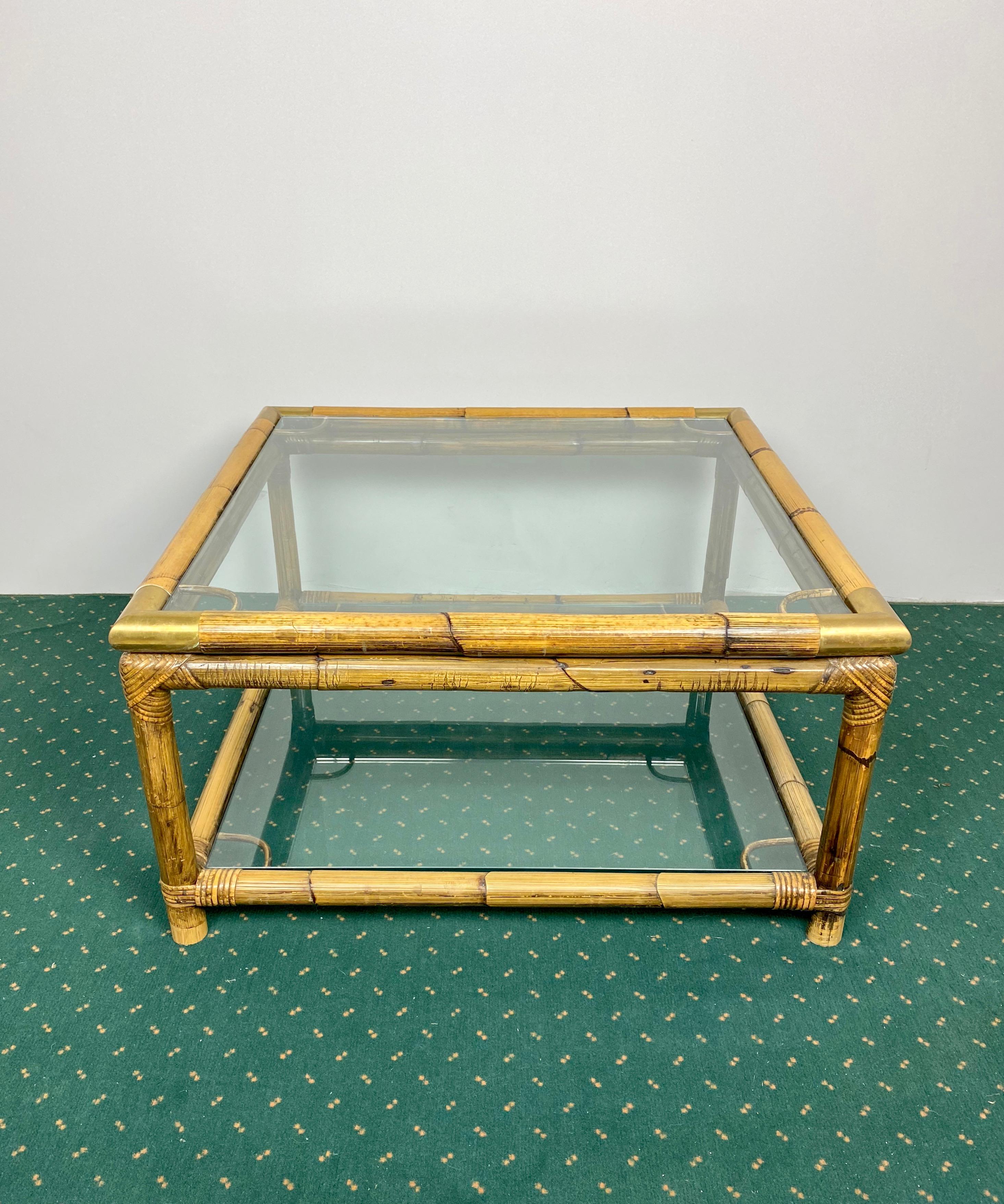 Coffee side table in bamboo structure & brass corners with two glass shelves. Made in Italy in the 1970s.